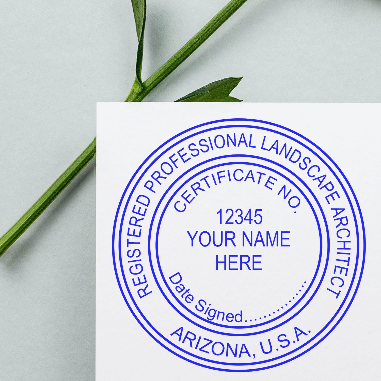 Arizona Landscape Architectural Seal Stamp by ESS being used on a document, featuring the state of Arizona and landscape design elements.