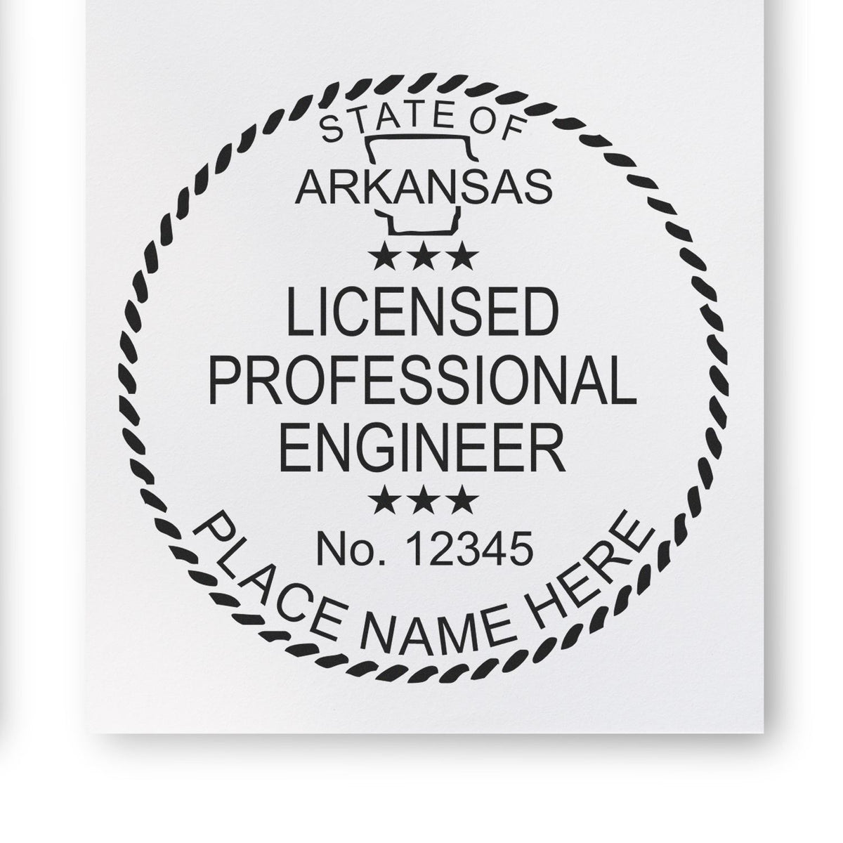 This paper is stamped with a sample imprint of the Arkansas Professional Engineer Seal Stamp, signifying its quality and reliability.