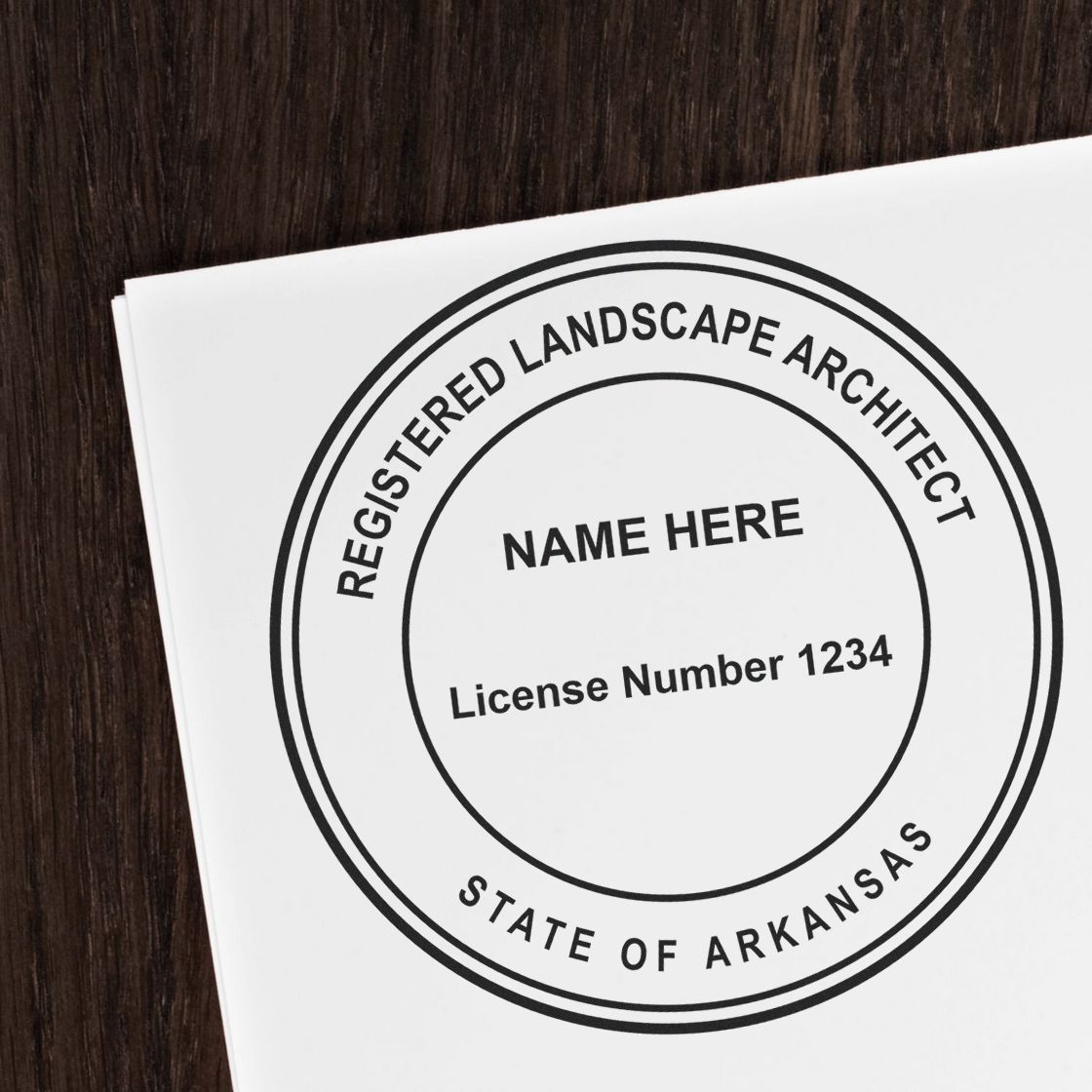 A stamped impression of the Self-Inking Arkansas Landscape Architect Stamp in this stylish lifestyle photo, setting the tone for a unique and personalized product.