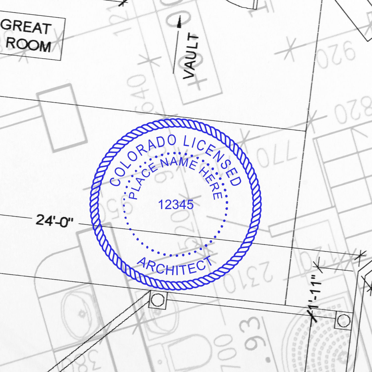 Colorado Architect Seal Stamp on architectural blueprint, showing detailed floor plans and measurements.
