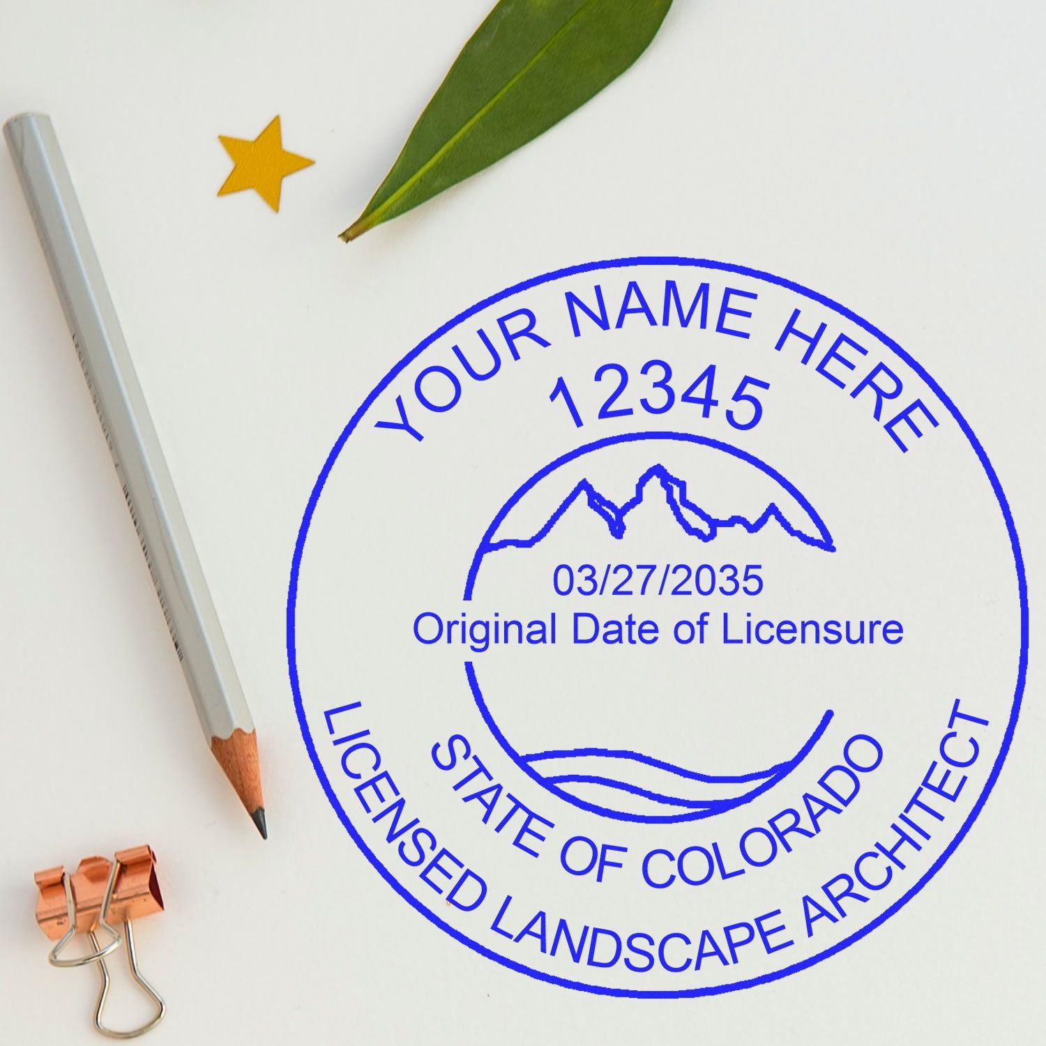 Trodat Colorado landscape architect seal stamp in use, featuring a detailed Colorado state map and landscape design elements.