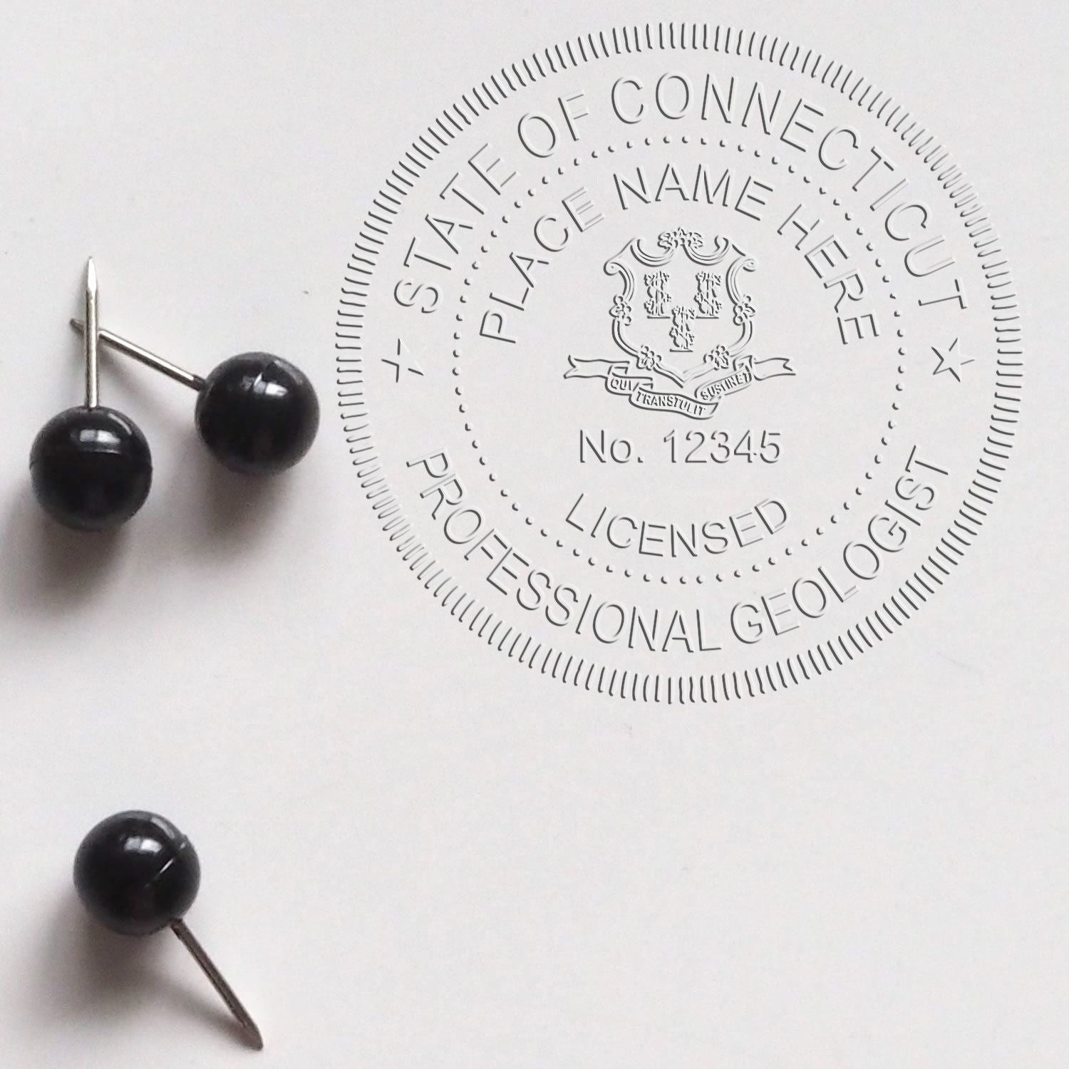 A stamped imprint of the Connecticut Geologist Desk Seal in this stylish lifestyle photo, setting the tone for a unique and personalized product.