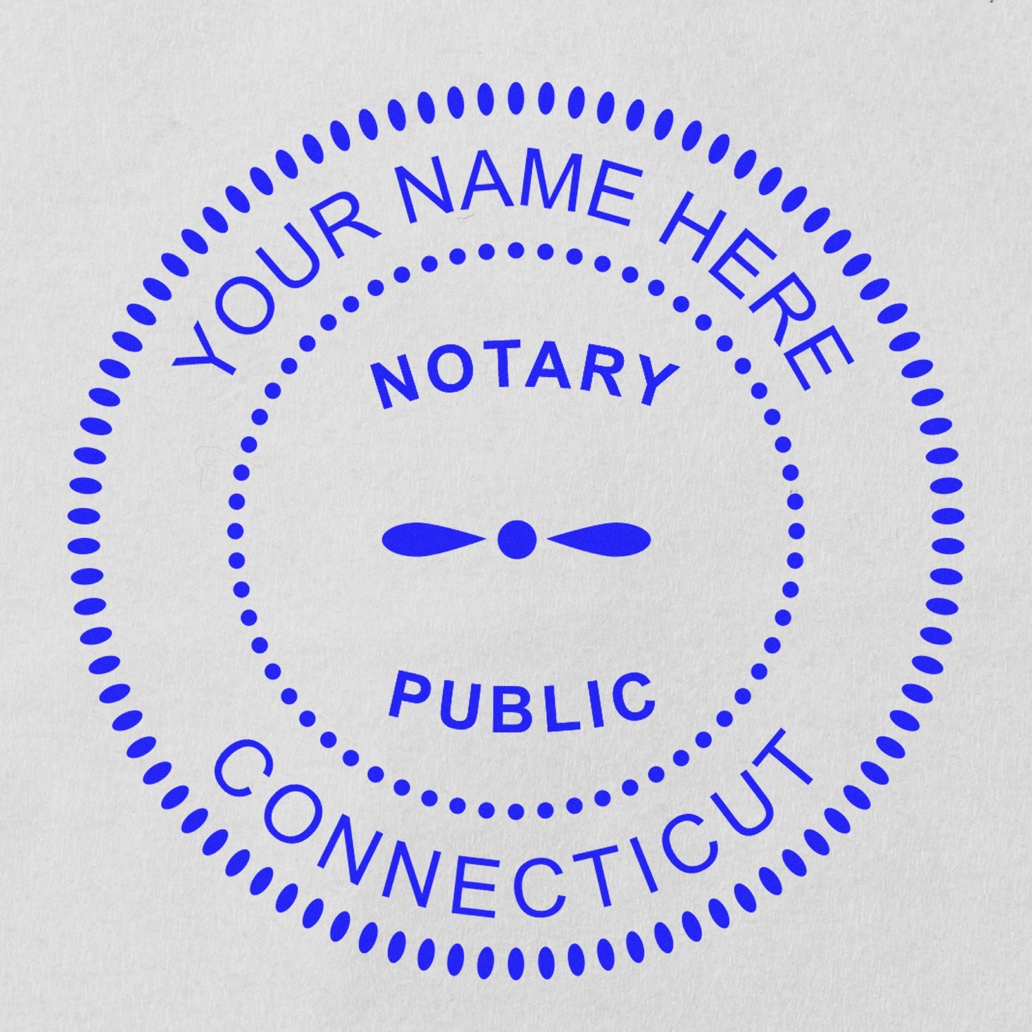 A stamped impression of the Connecticut Round Electronic Notary Stamp in this stylish lifestyle photo, setting the tone for a unique and personalized product.