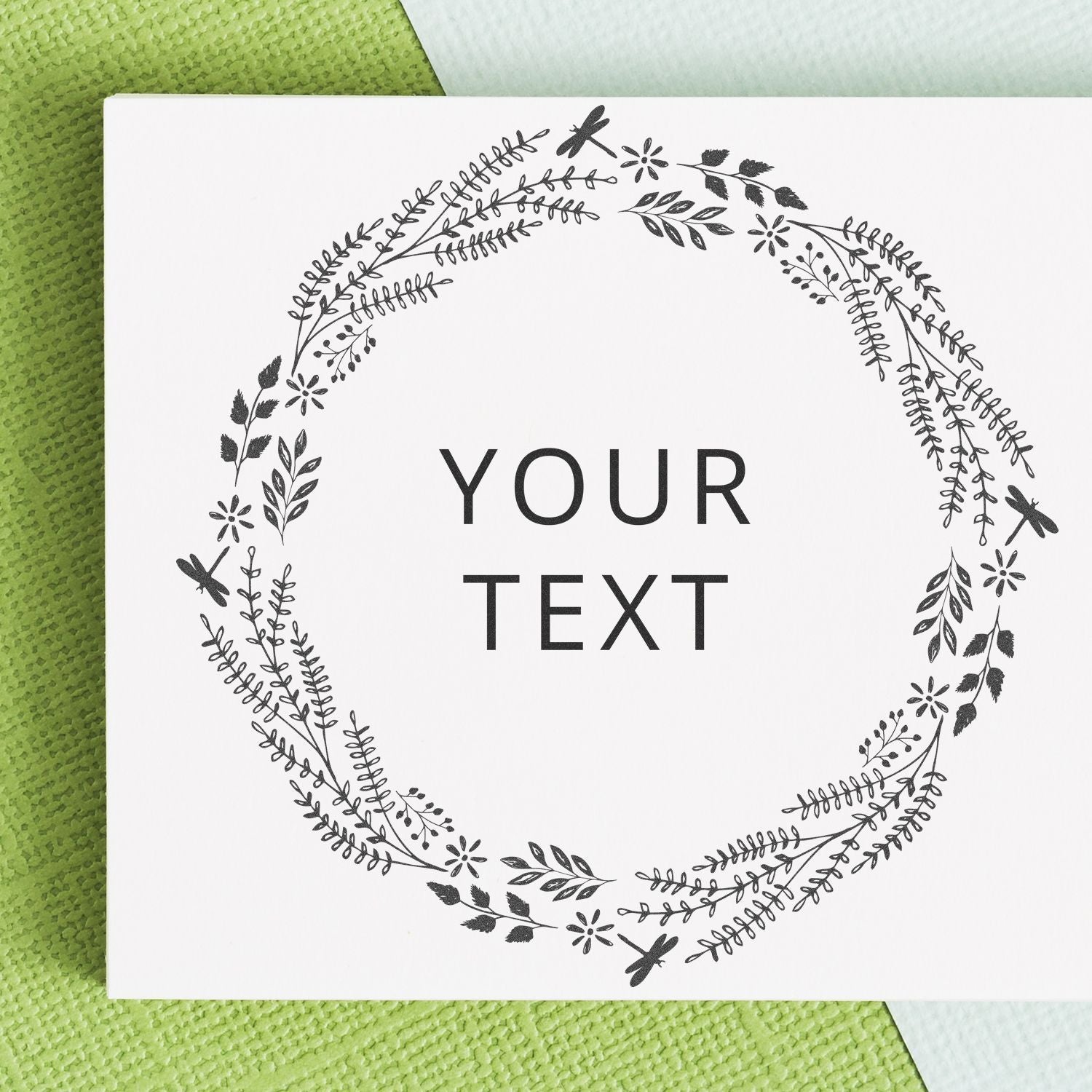 Custom Rubber Stamp Size 5 Inch Diameter imprinting YOUR TEXT in the center of a floral wreath design on a white card.