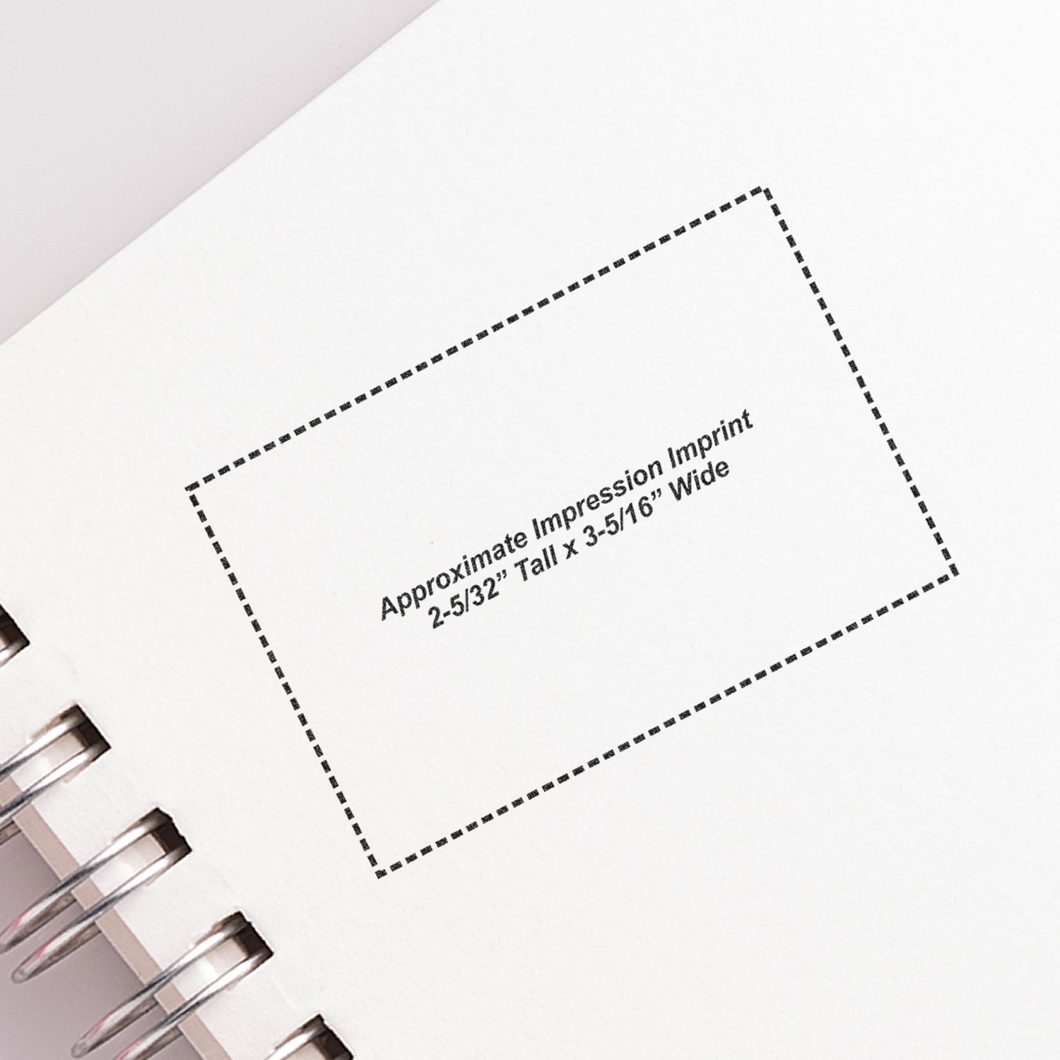 Custom Self Inking Stamp Trodat 5211 Size 2-5/32 x 3-5/16 imprint on white paper with spiral binding, showing approximate impression size.