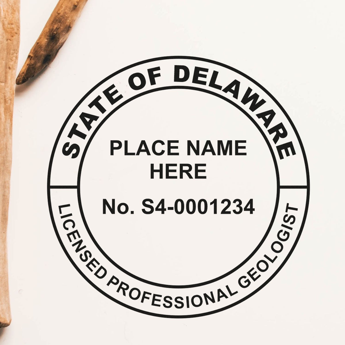 A photograph of the Slim Pre-Inked Delaware Professional Geologist Seal Stamp  impression reveals a vivid, professional image of the on paper.