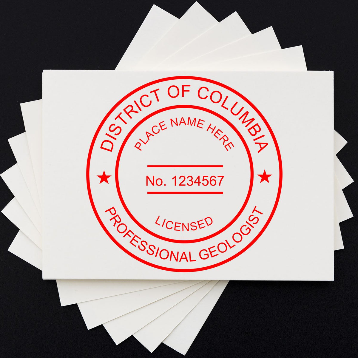 A lifestyle photo showing a stamped image of the District of Columbia Professional Geologist Seal Stamp on a piece of paper