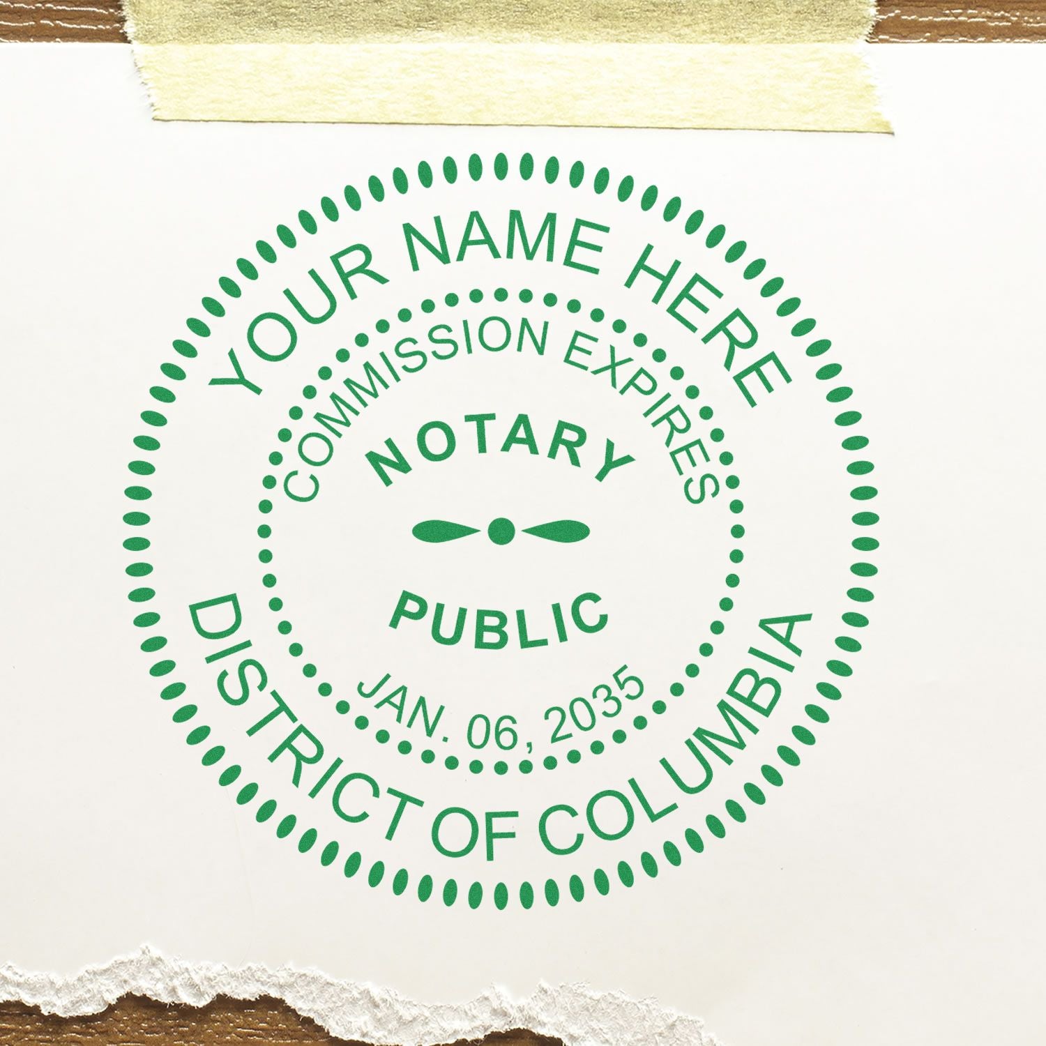 A lifestyle photo showing a stamped image of the Premium Pre-Inked DC MaxLight Notary Public Stamp on a piece of paper