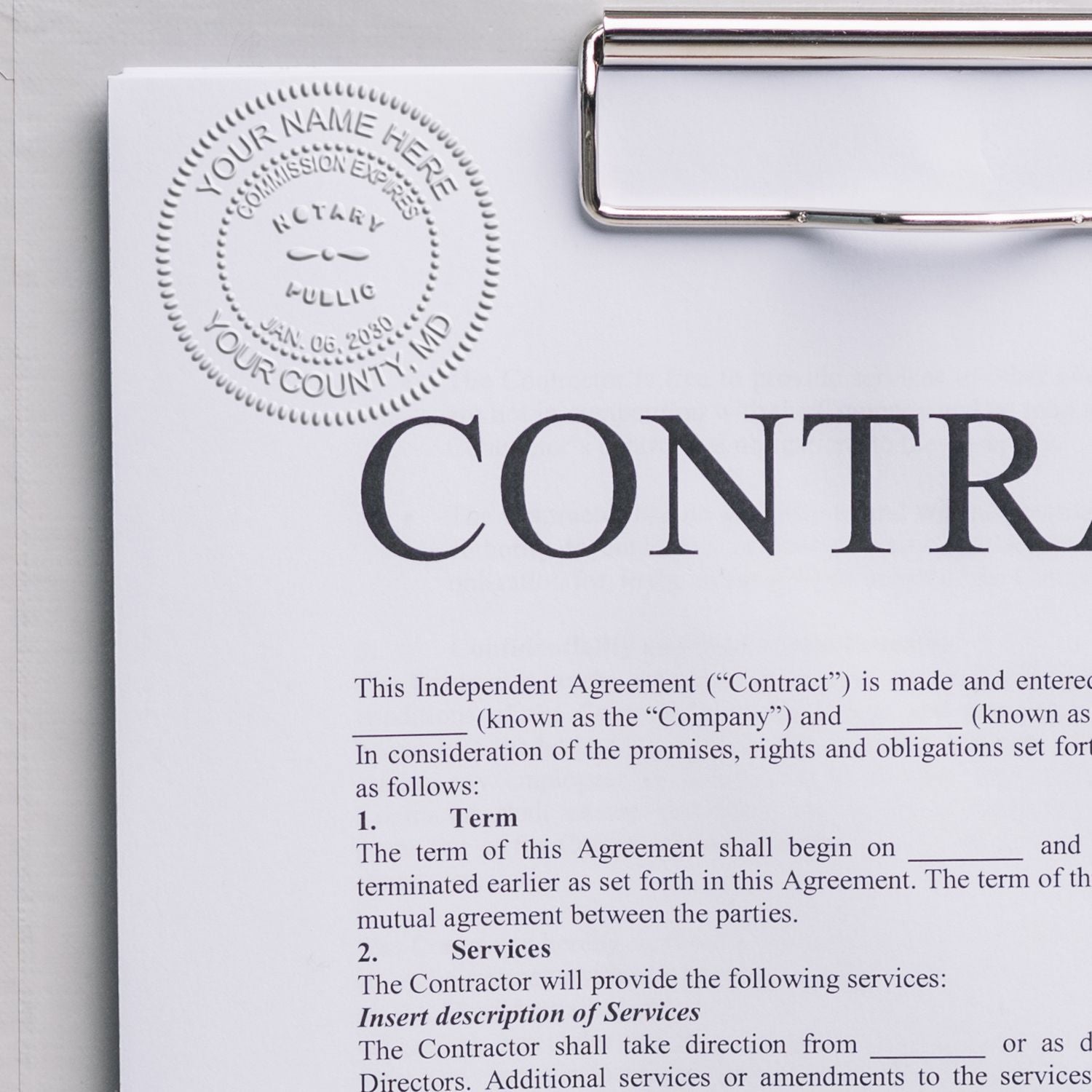Long Reach Notary Seal Embosser in use, embossing a notary seal on a contract document clipped to a clipboard.