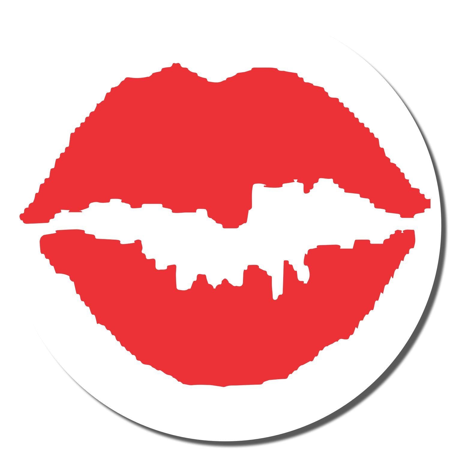 Red lips imprint from the Round Kiss Xstamper Stamp on a white background.
