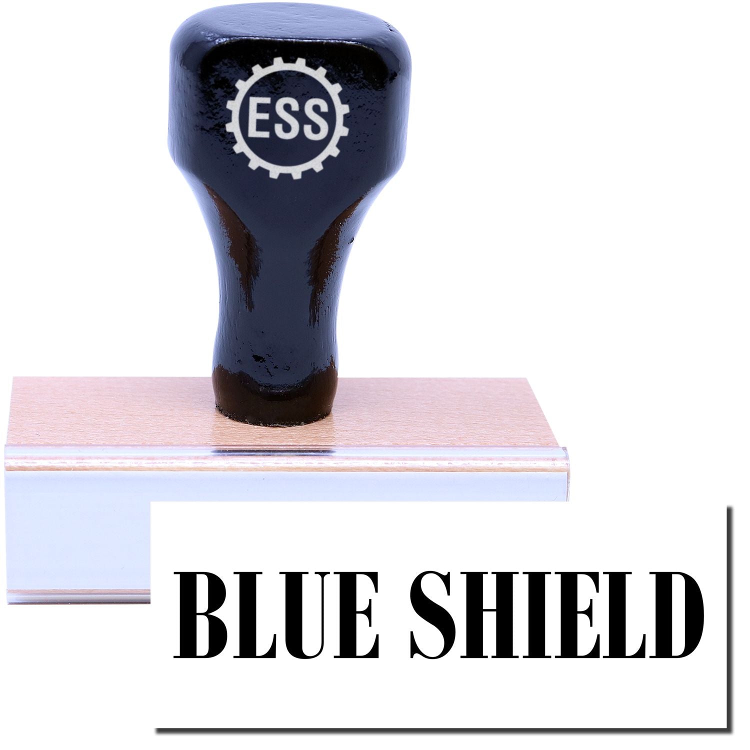 A stock office medical rubber stamp with a stamped image showing how the text "BLUE SHIELD" is displayed after stamping.