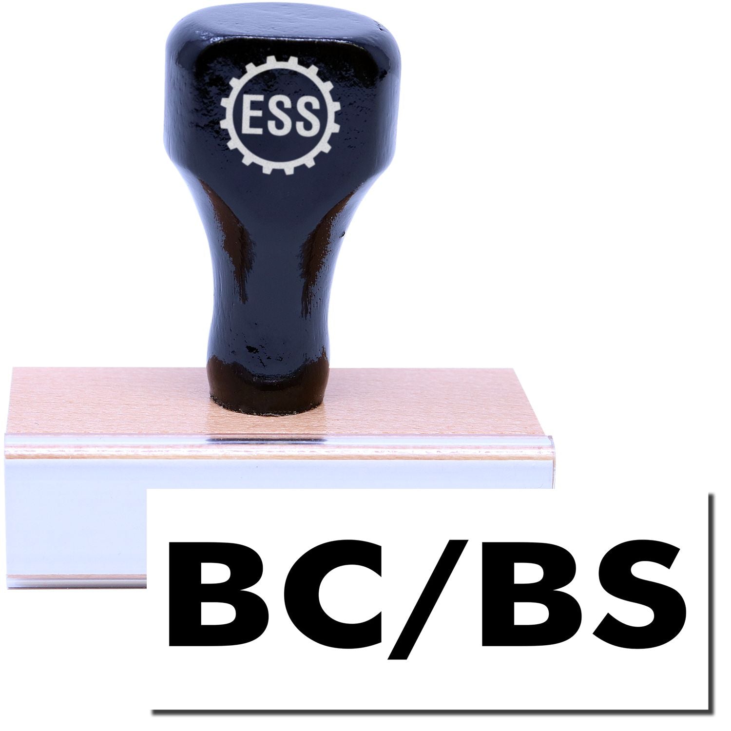 A stock office medical rubber stamp with a stamped image showing how the text "BC/BS" is displayed after stamping.