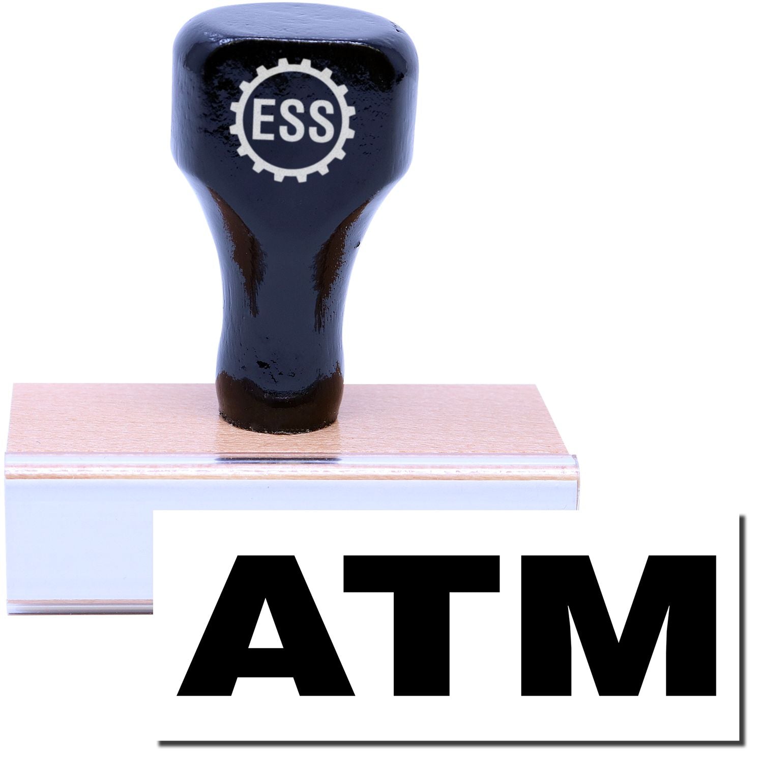 A stock office rubber stamp with a stamped image showing how the text "ATM" is displayed after stamping.