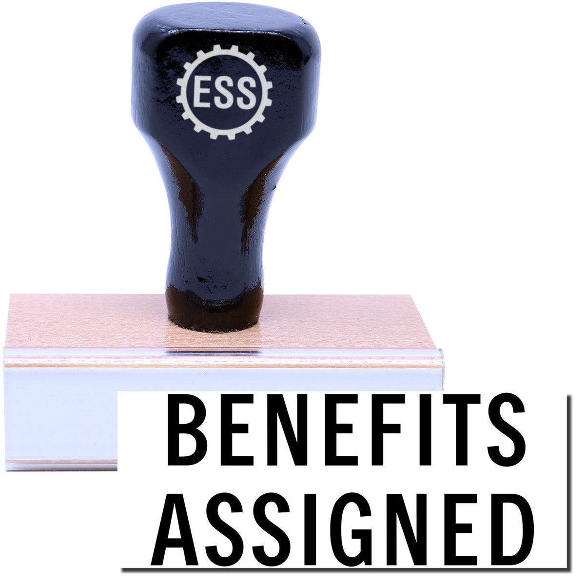 A stock office rubber stamp with a stamped image showing how the text &quot;BENEFITS ASSIGNED&quot; is displayed after stamping.