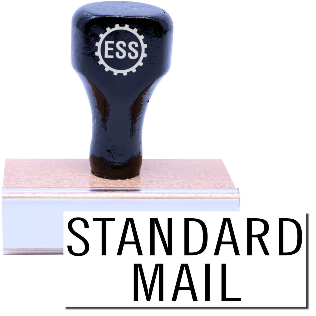 A stock office rubber stamp with a stamped image showing how the text &quot;STANDARD MAIL&quot; in a large font and in a stacked style is displayed after stamping.