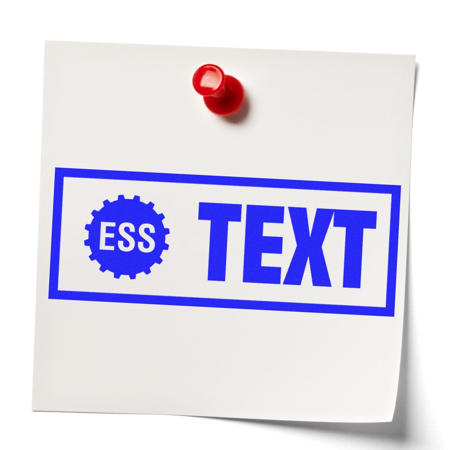 A white note pinned with a red pushpin, stamped with ESS TEXT using the Super Slim 1442 Customized Pre-Inked Stamp 1/2 x 1-5/8 in blue ink.