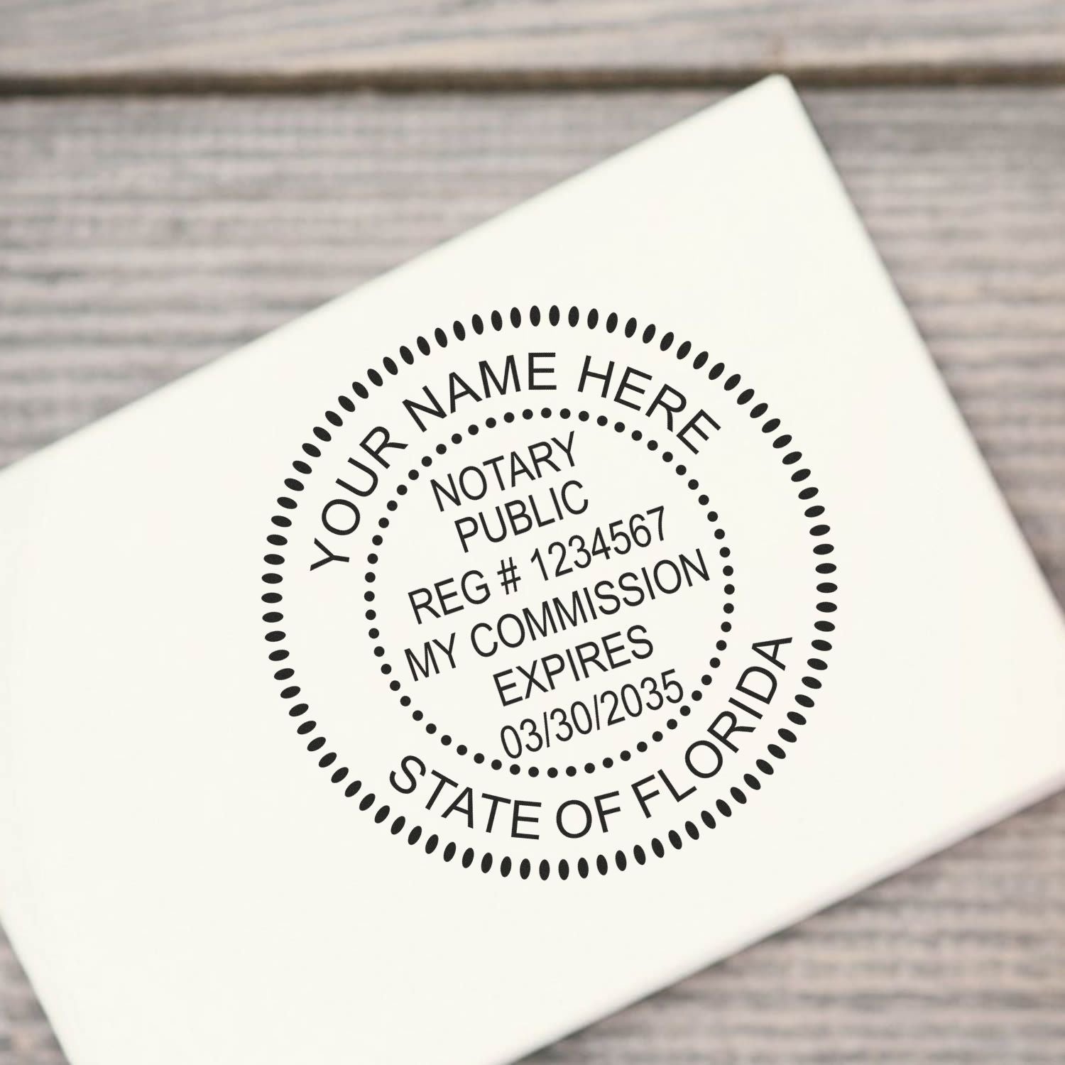 Another Example of a stamped impression of the Official Self-Inking Florida Notary Stamp on a piece of office paper.