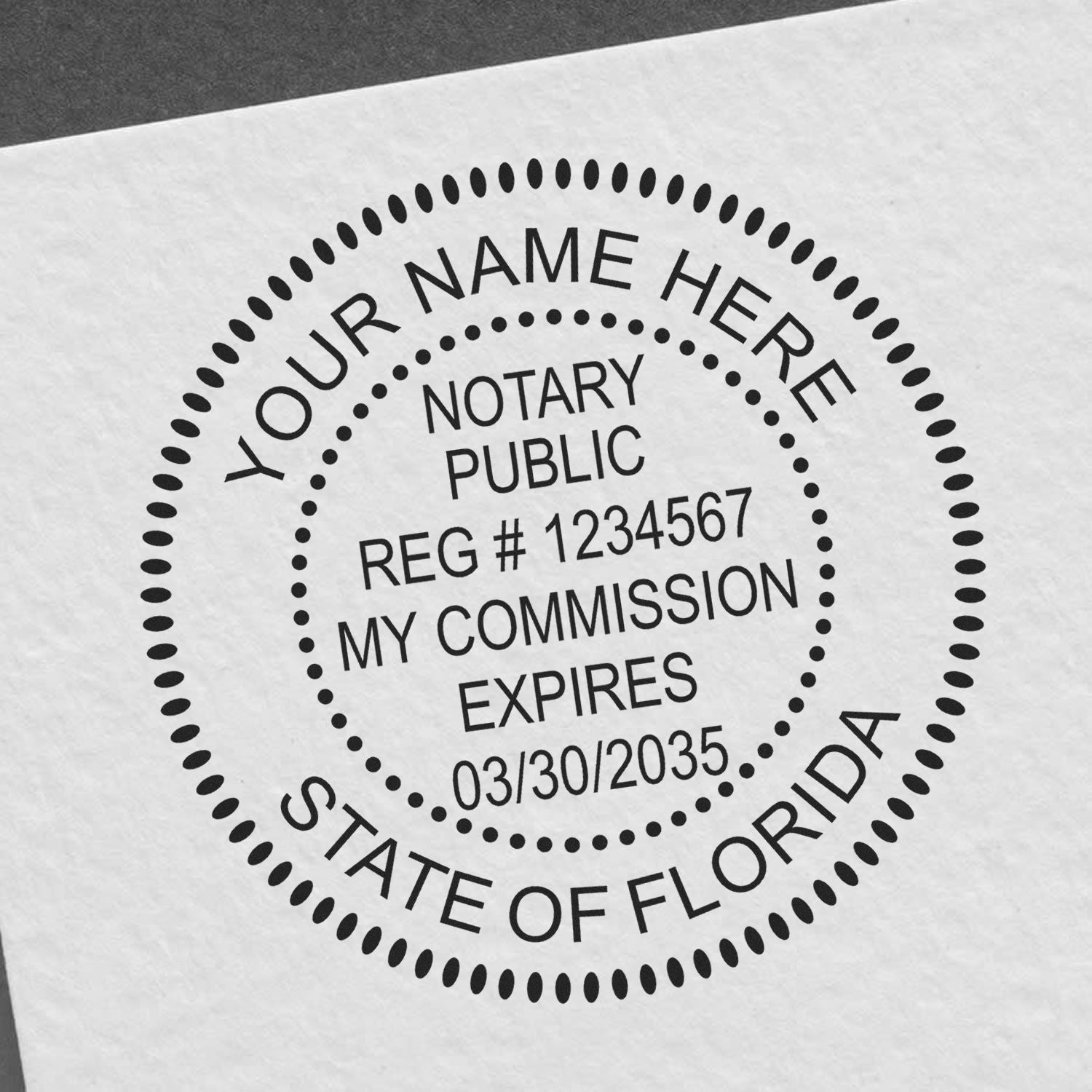 A photograph of the Heavy-Duty Round Florida Notary Stamp stamp impression reveals a vivid, professional image of the on paper.