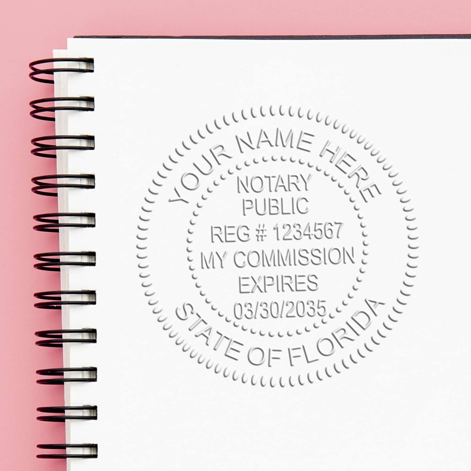 The Florida Handheld Notary Seal Embosser stamp impression comes to life with a crisp, detailed photo on paper - showcasing true professional quality.
