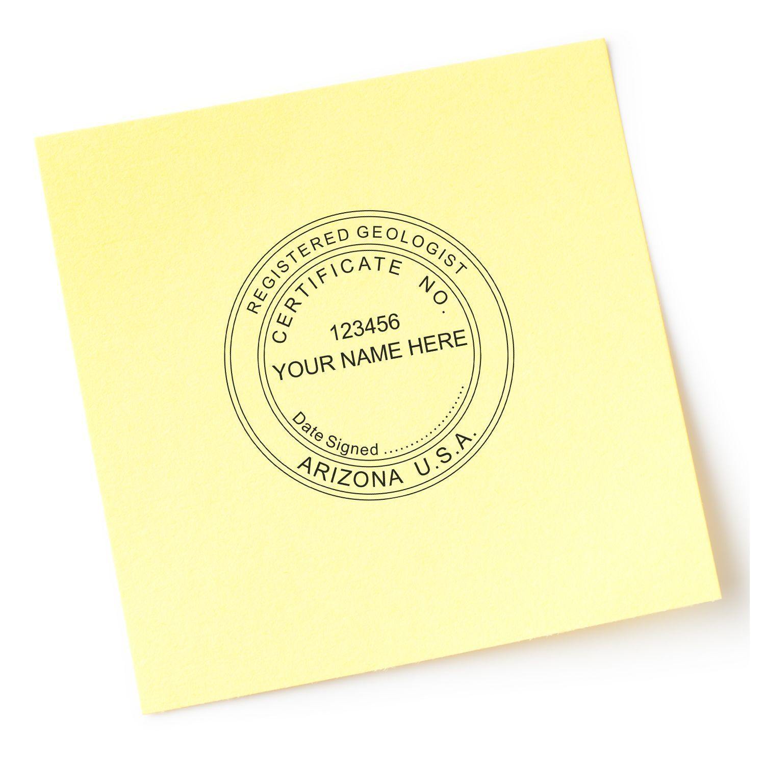 Geologist Regular Rubber Stamp of Seal on a yellow paper, displaying Registered Geologist with space for certificate number, name, and date signed.