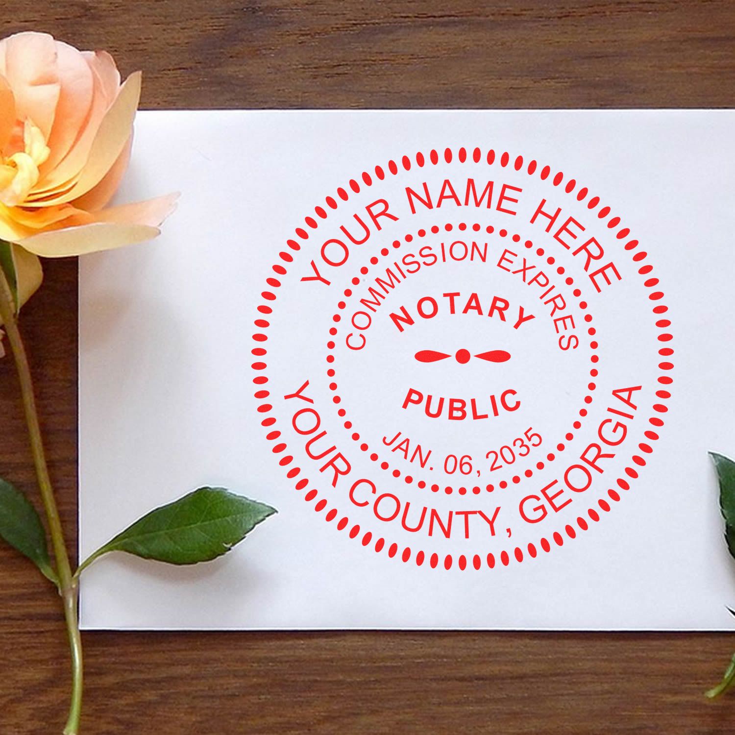 A stamped impression of the Slim Pre-Inked Round Notary Stamp for Georgia in this stylish lifestyle photo, setting the tone for a unique and personalized product.