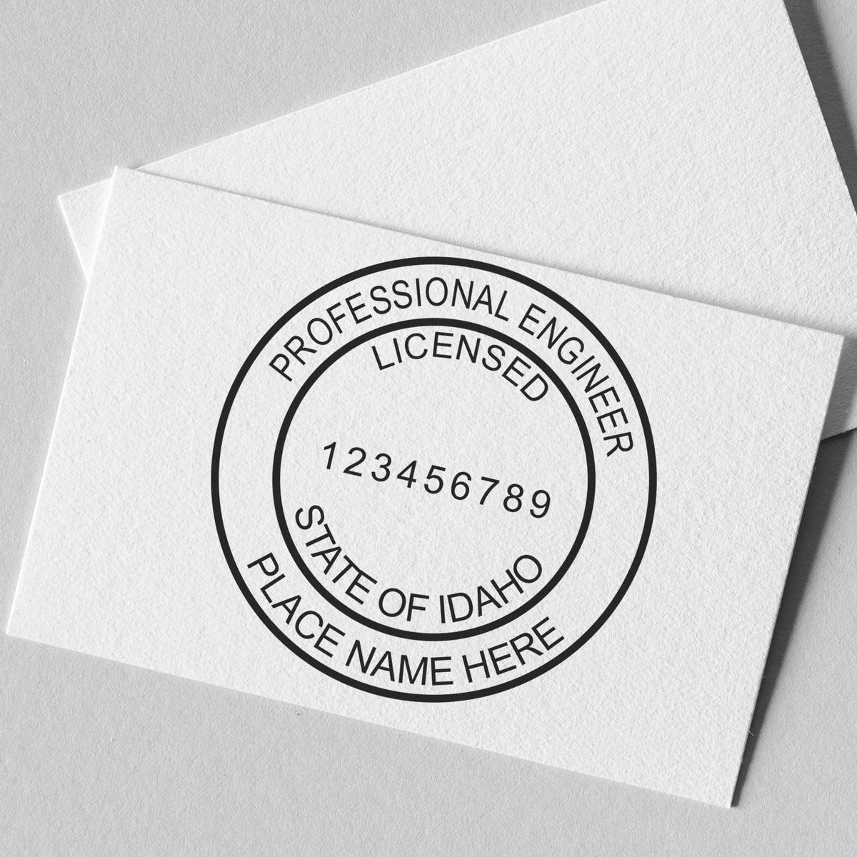 A stamped impression of the Slim Pre-Inked Idaho Professional Engineer Seal Stamp in this stylish lifestyle photo, setting the tone for a unique and personalized product.