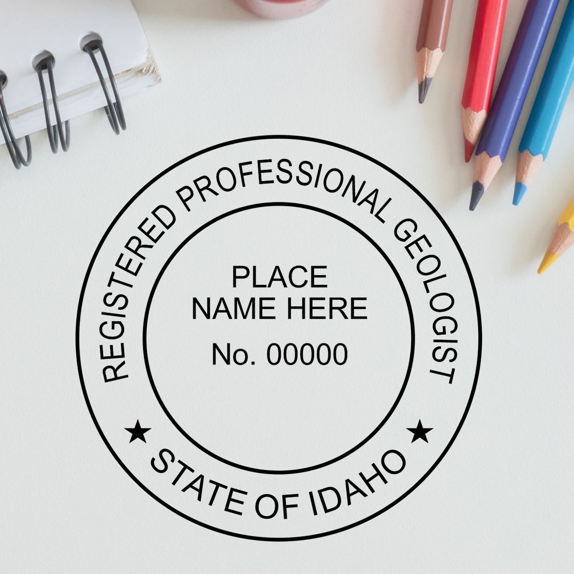 A lifestyle photo showing a stamped image of the Slim Pre-Inked Idaho Professional Geologist Seal Stamp on a piece of paper