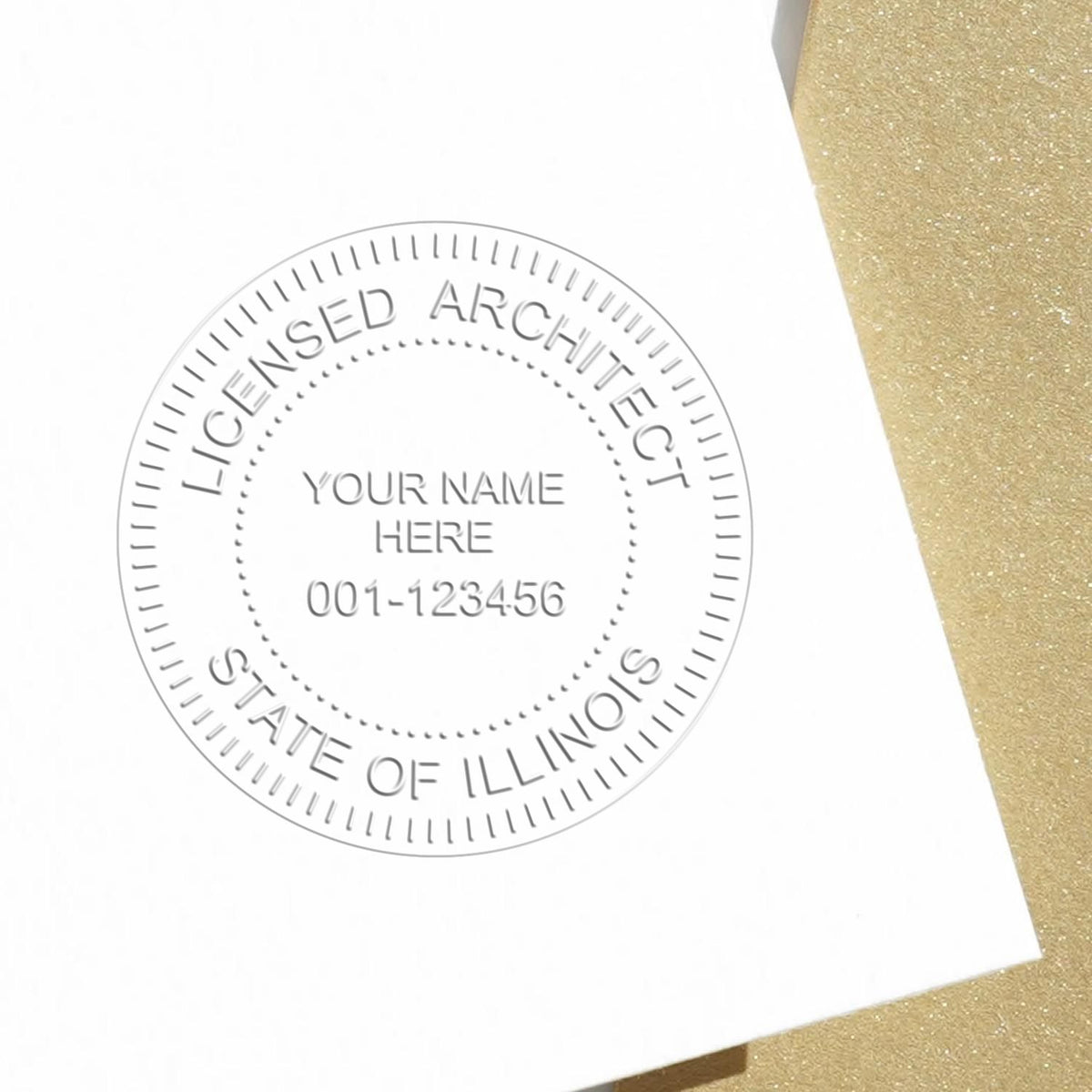 A lifestyle photo showing a stamped image of the Handheld Illinois Architect Seal Embosser on a piece of paper
