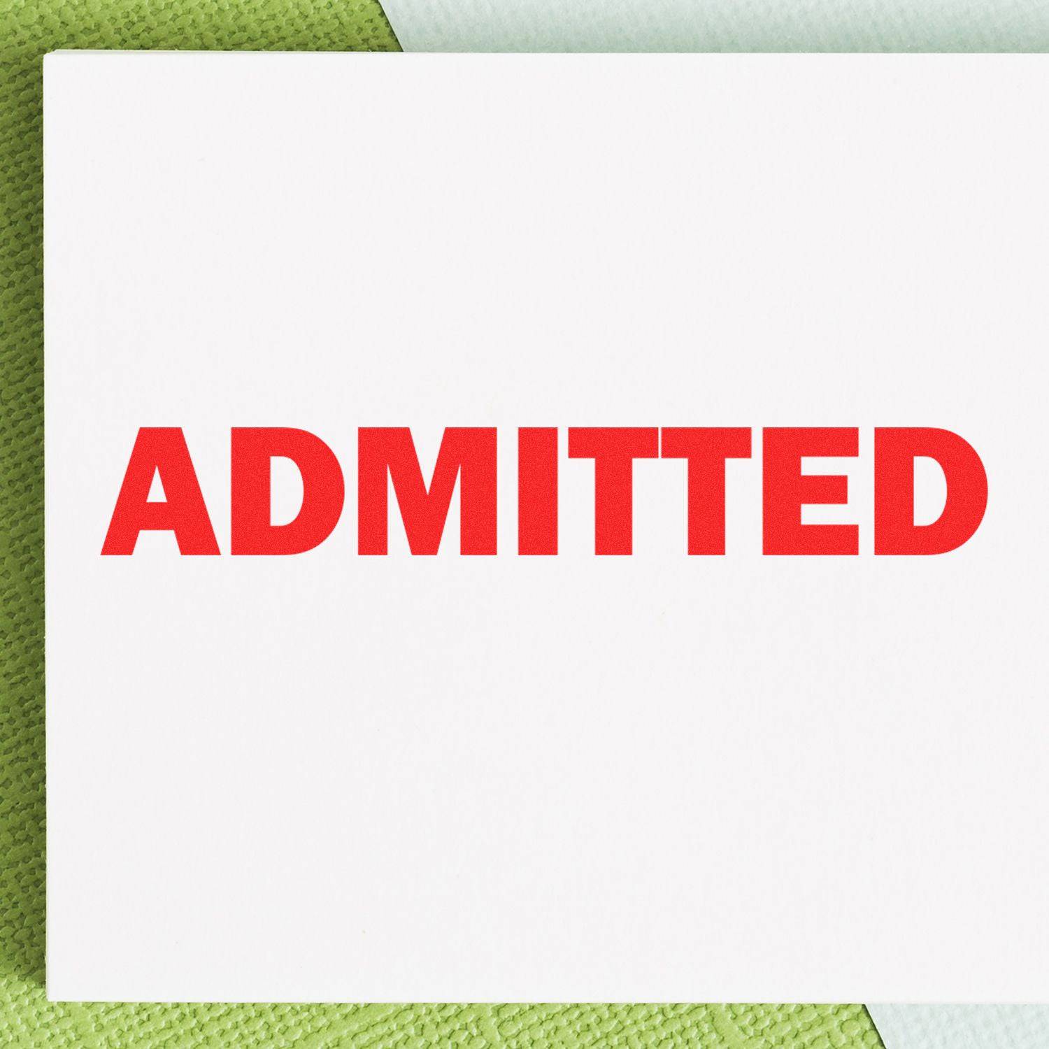 Large Self Inking Admitted Stamp in use, displaying the word ADMITTED in bold red letters on a white card background.