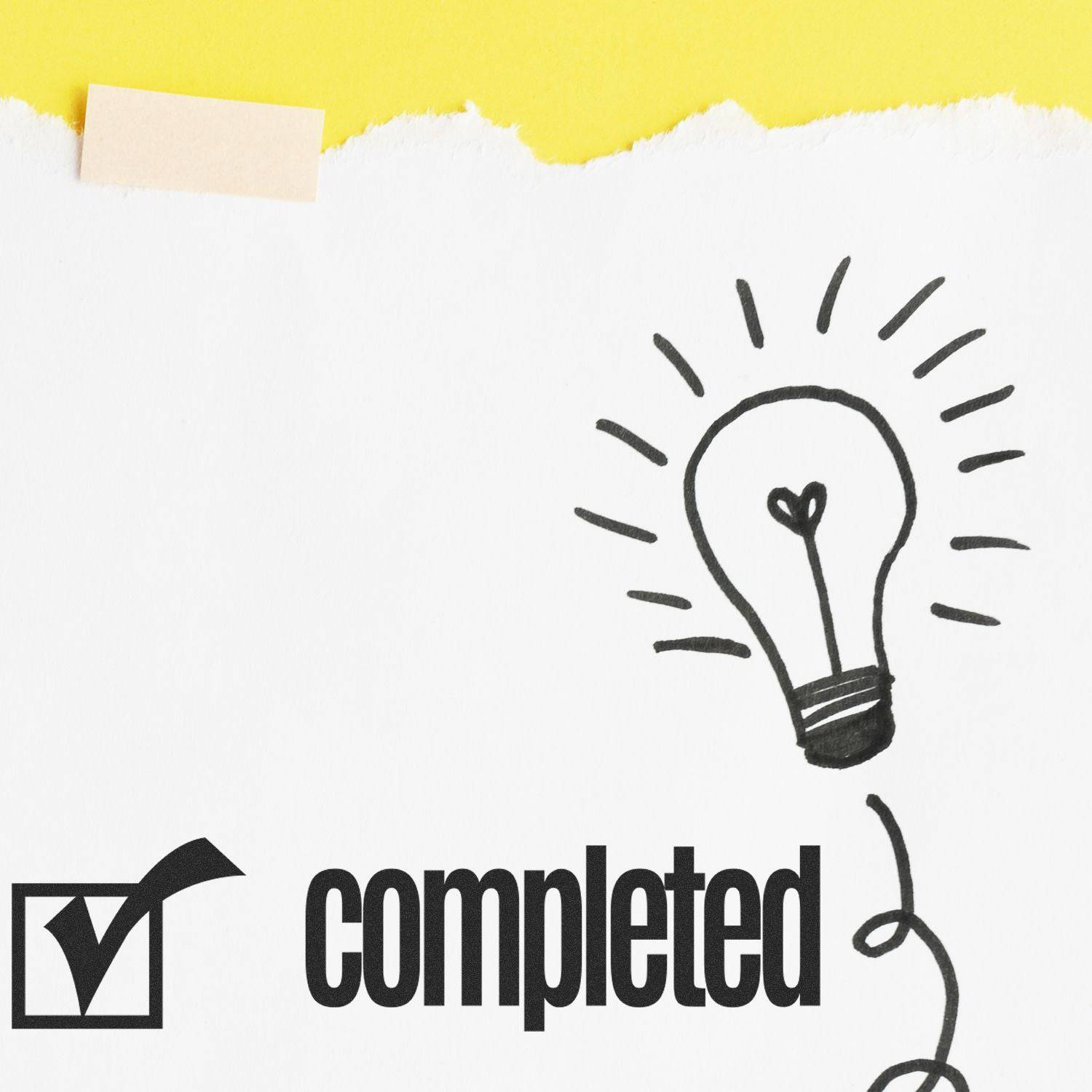 A piece of paper with a hand-drawn light bulb and the Large Self Inking Completed with Checkbox Stamp marking a checkbox next to the word 'completed' in bold black letters.