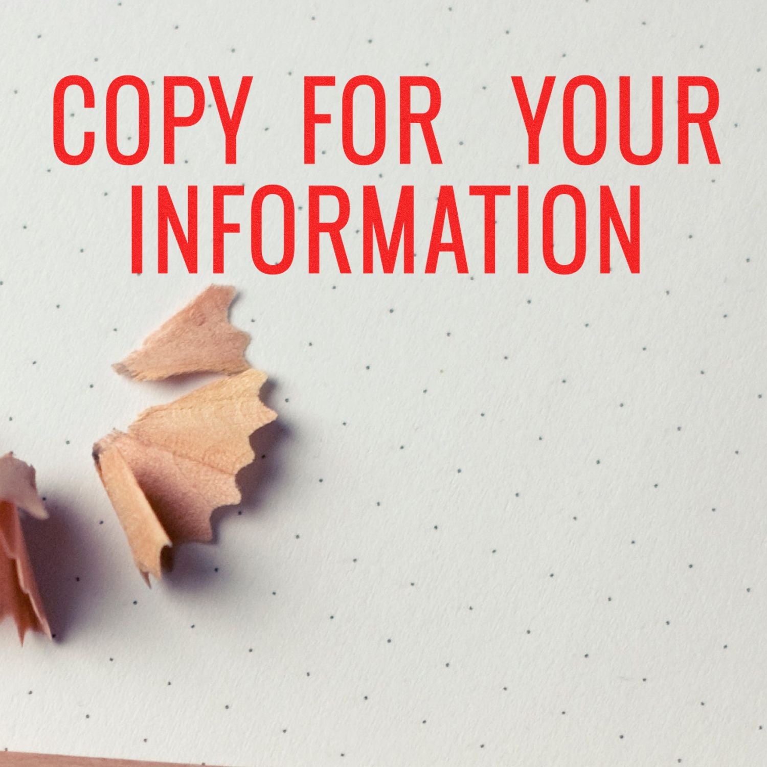 Large Narrow Copy for your Information Rubber Stamp in red ink on dotted paper with pencil shavings nearby.