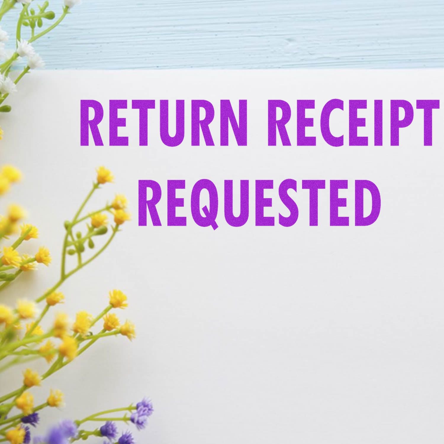 Return Receipt Requested Rubber Stamp in purple ink on white paper with yellow and purple flowers in the corner.