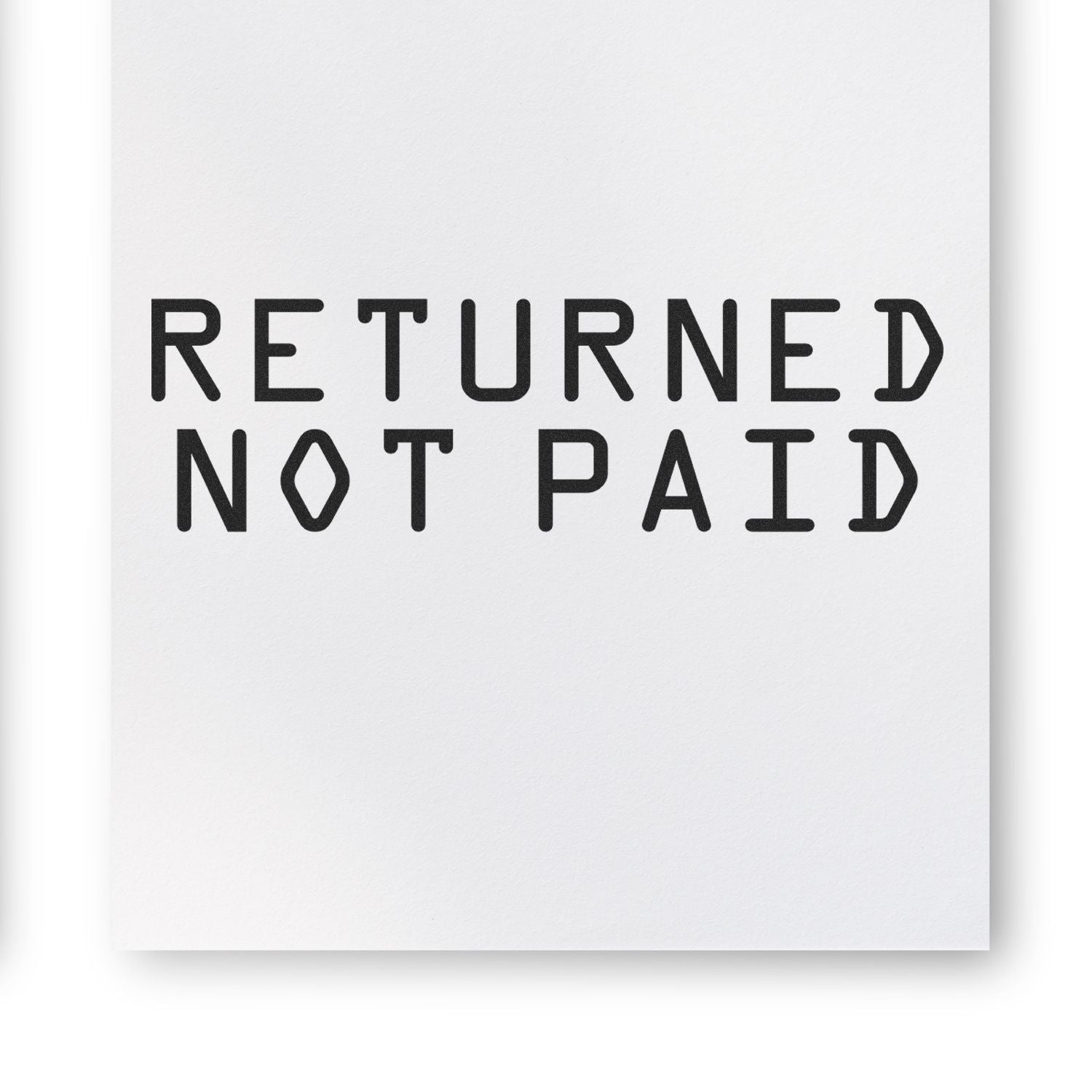 Returned Not Paid rubber stamp impression on white paper, featuring bold, black text in a modern, blocky font.