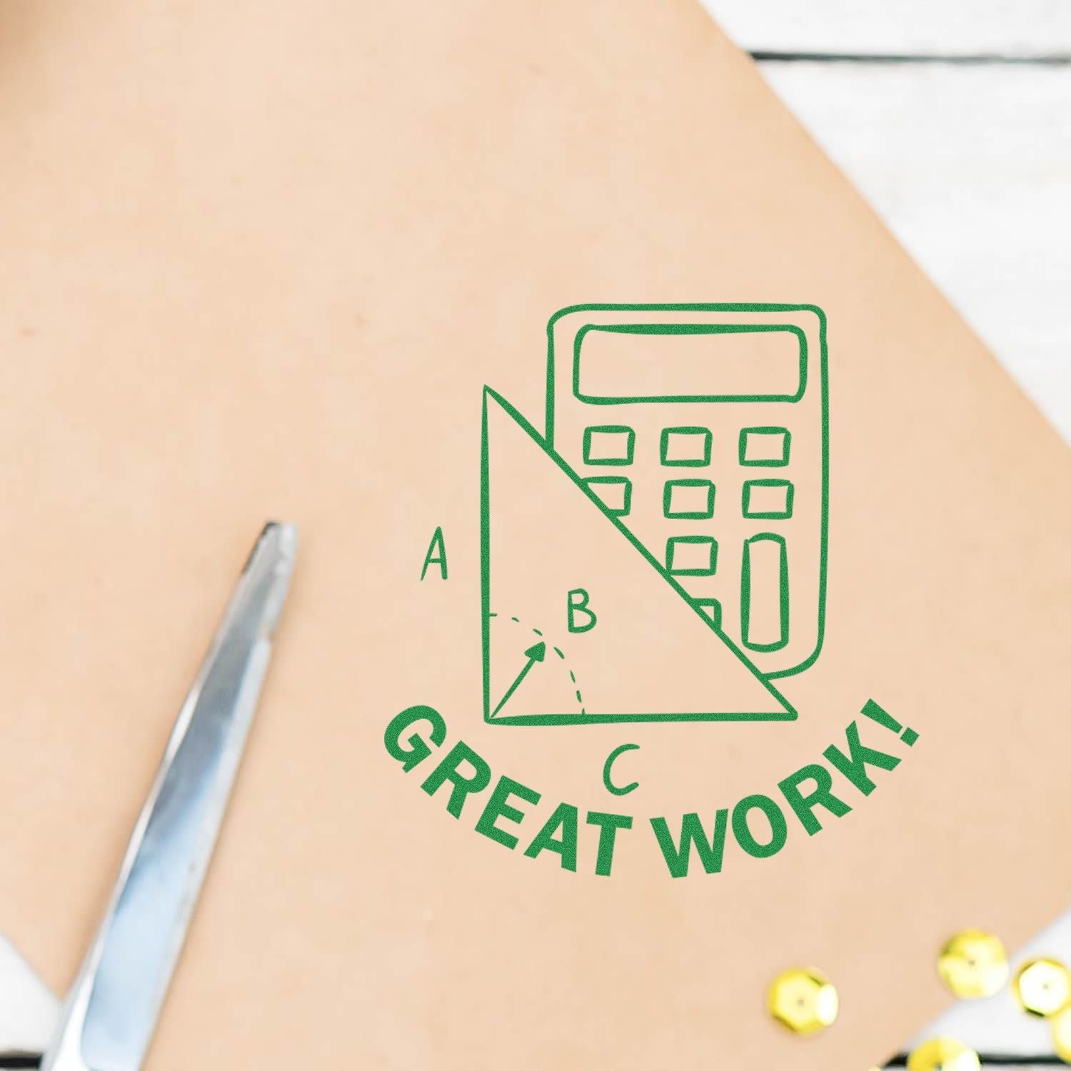 Self Inking Round Great Work with Calculator Stamp imprint on paper, featuring a green calculator and geometric shapes with Great Work! text.