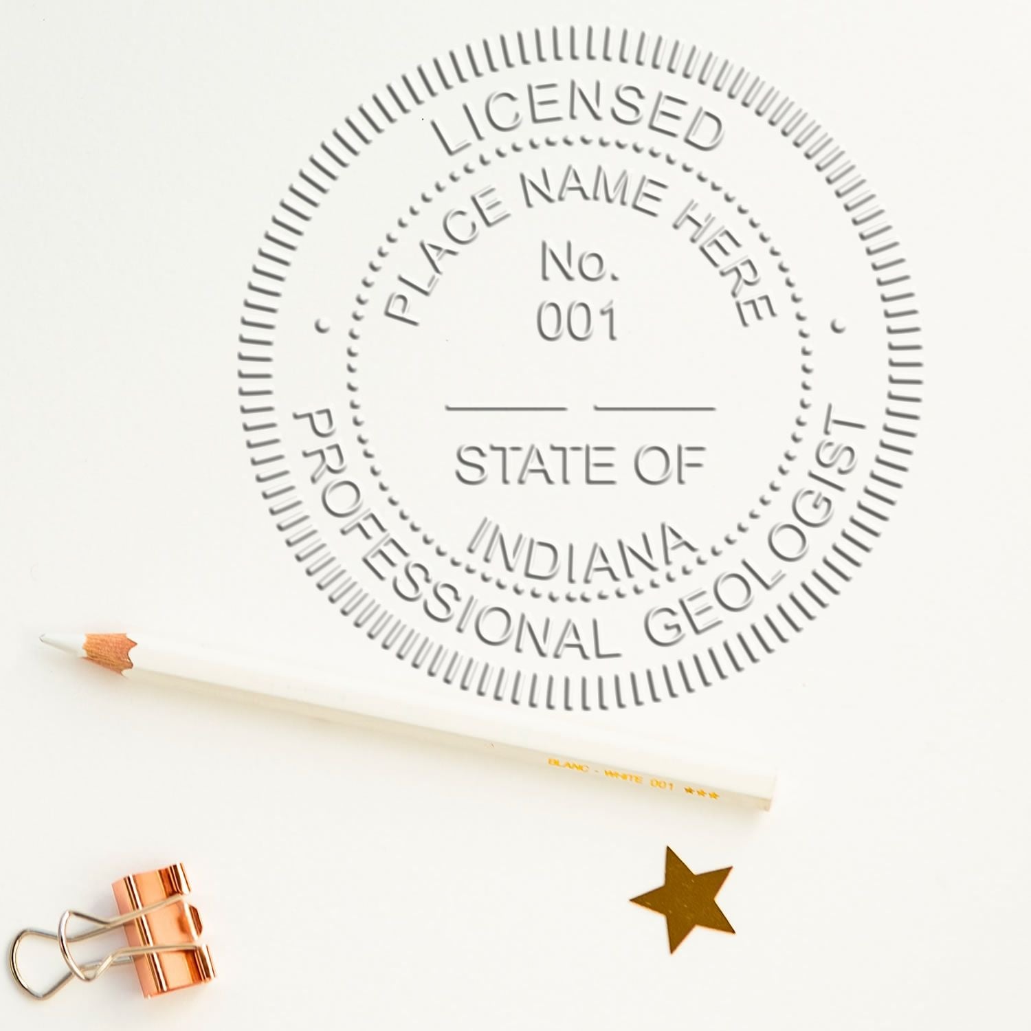 An alternative view of the State of Indiana Extended Long Reach Geologist Seal stamped on a sheet of paper showing the image in use