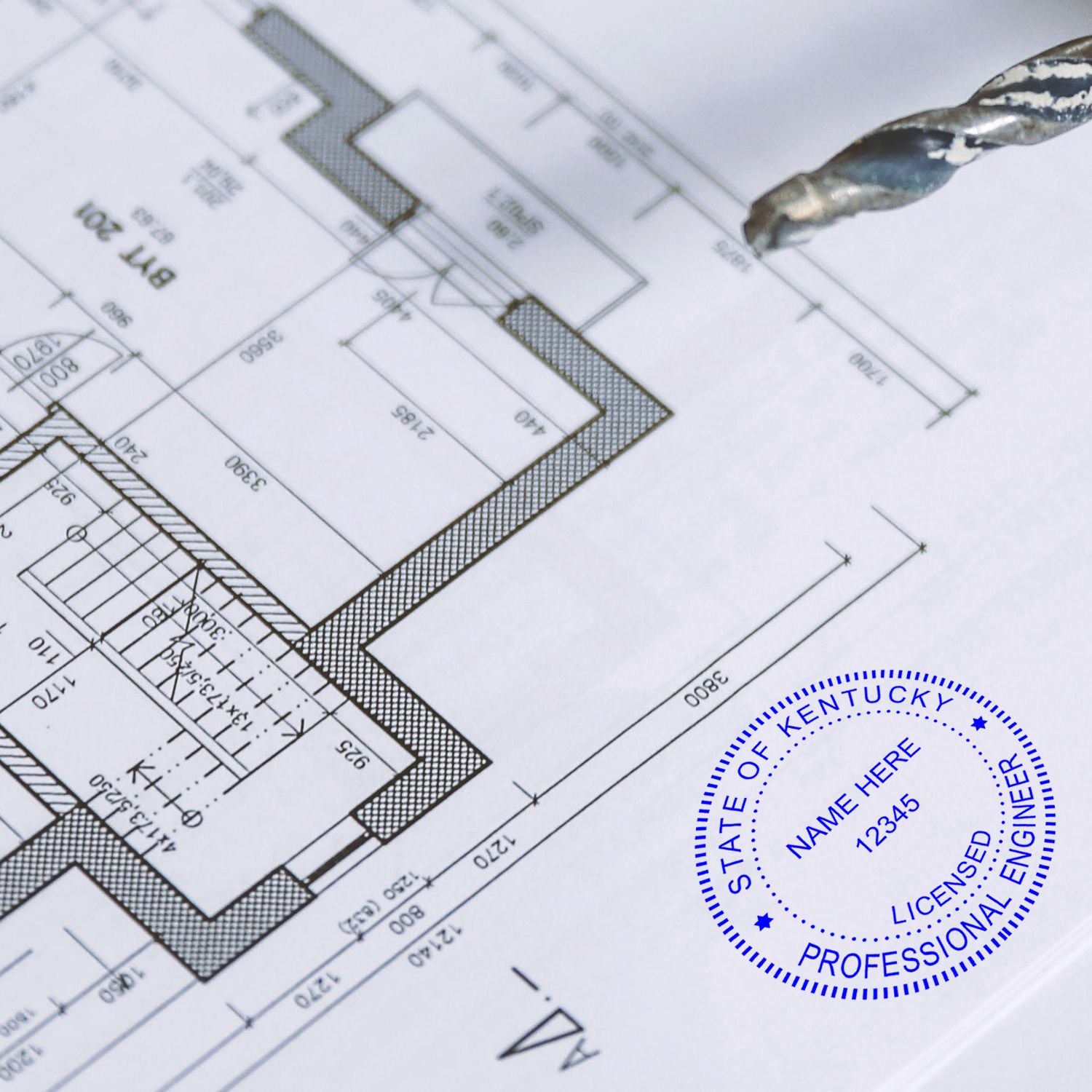 Another Example of a stamped impression of the Digital Kentucky PE Stamp and Electronic Seal for Kentucky Engineer on a piece of office paper.