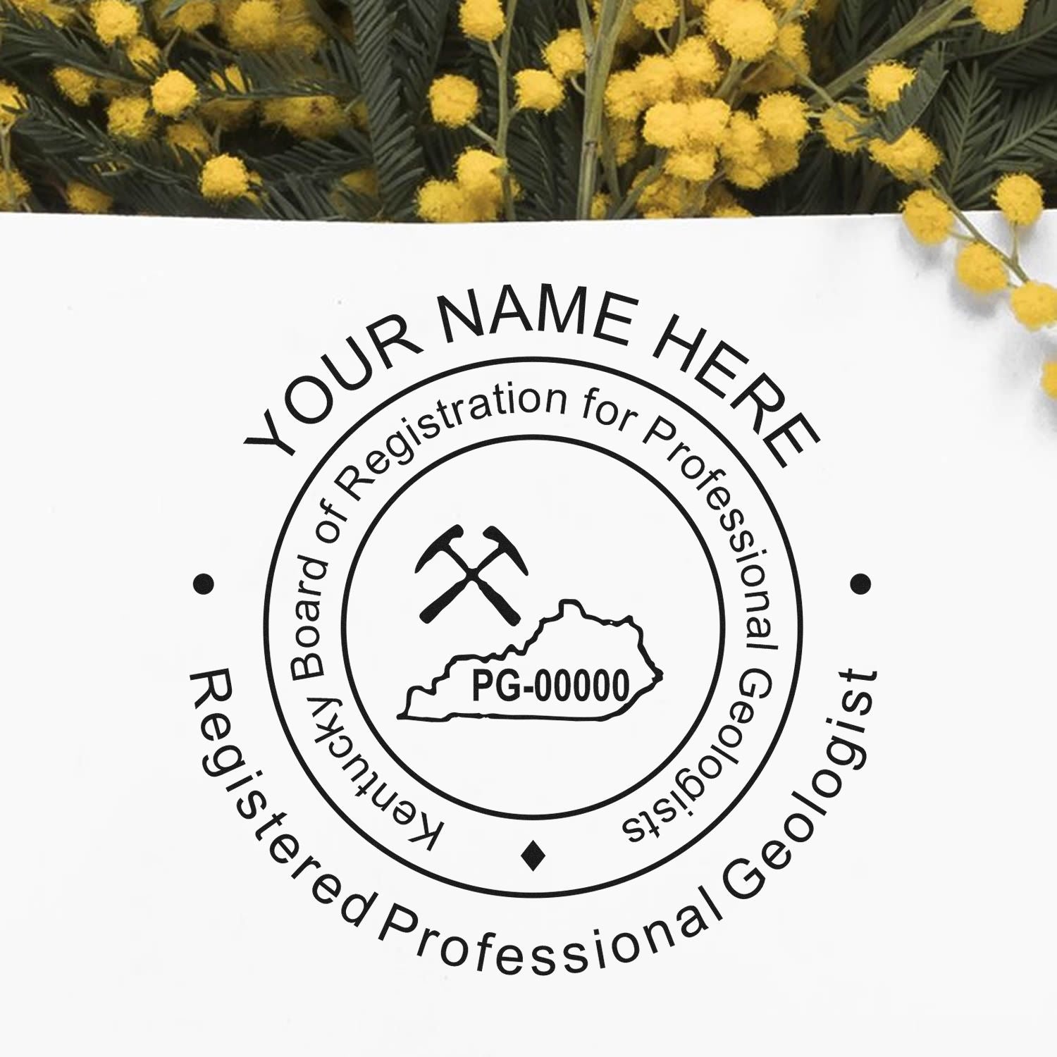 A lifestyle photo showing a stamped image of the Premium MaxLight Pre-Inked Kentucky Geology Stamp on a piece of paper