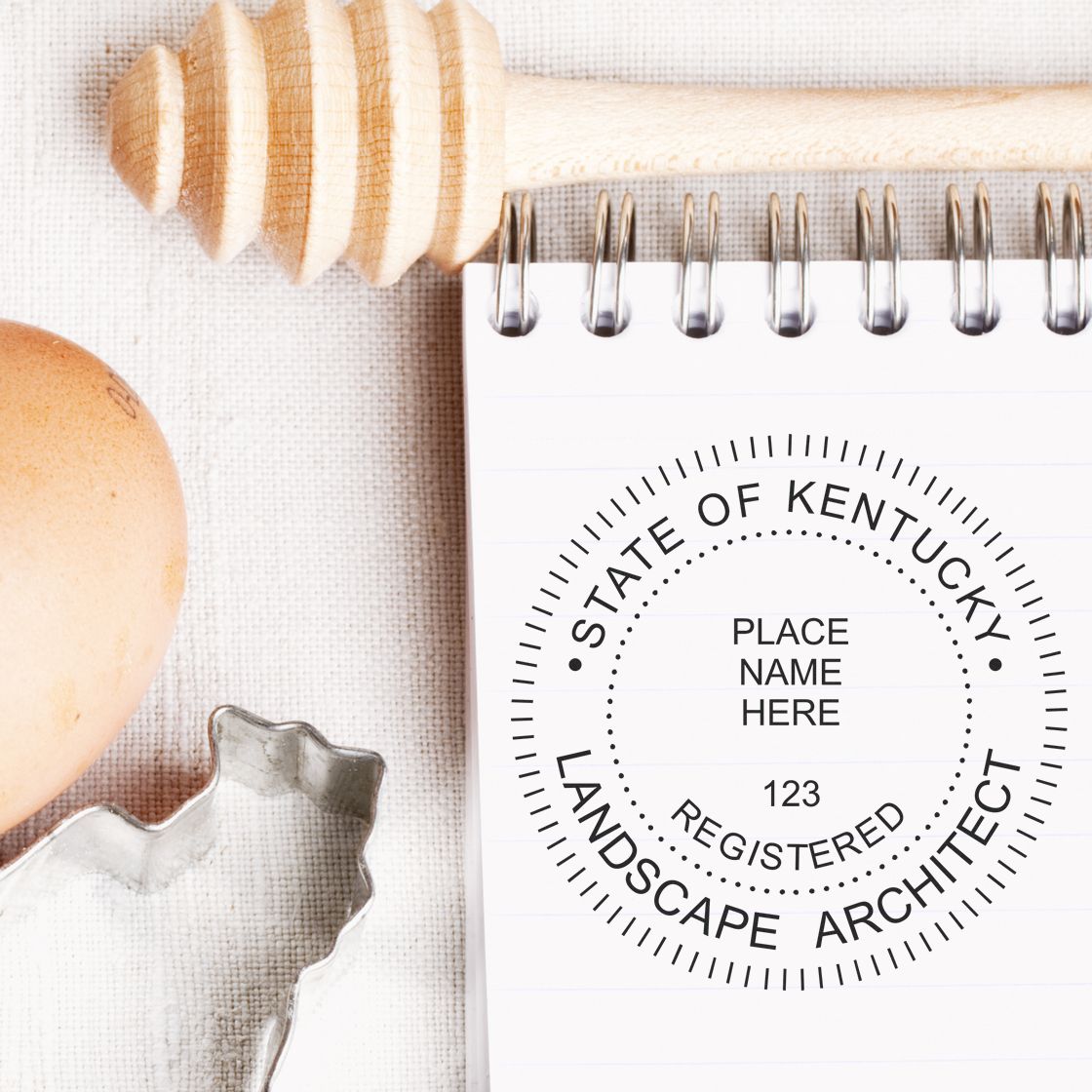 Slim Pre-Inked Kentucky Landscape Architect Seal Stamp in use photo showing a stamped imprint of the Slim Pre-Inked Kentucky Landscape Architect Seal Stamp