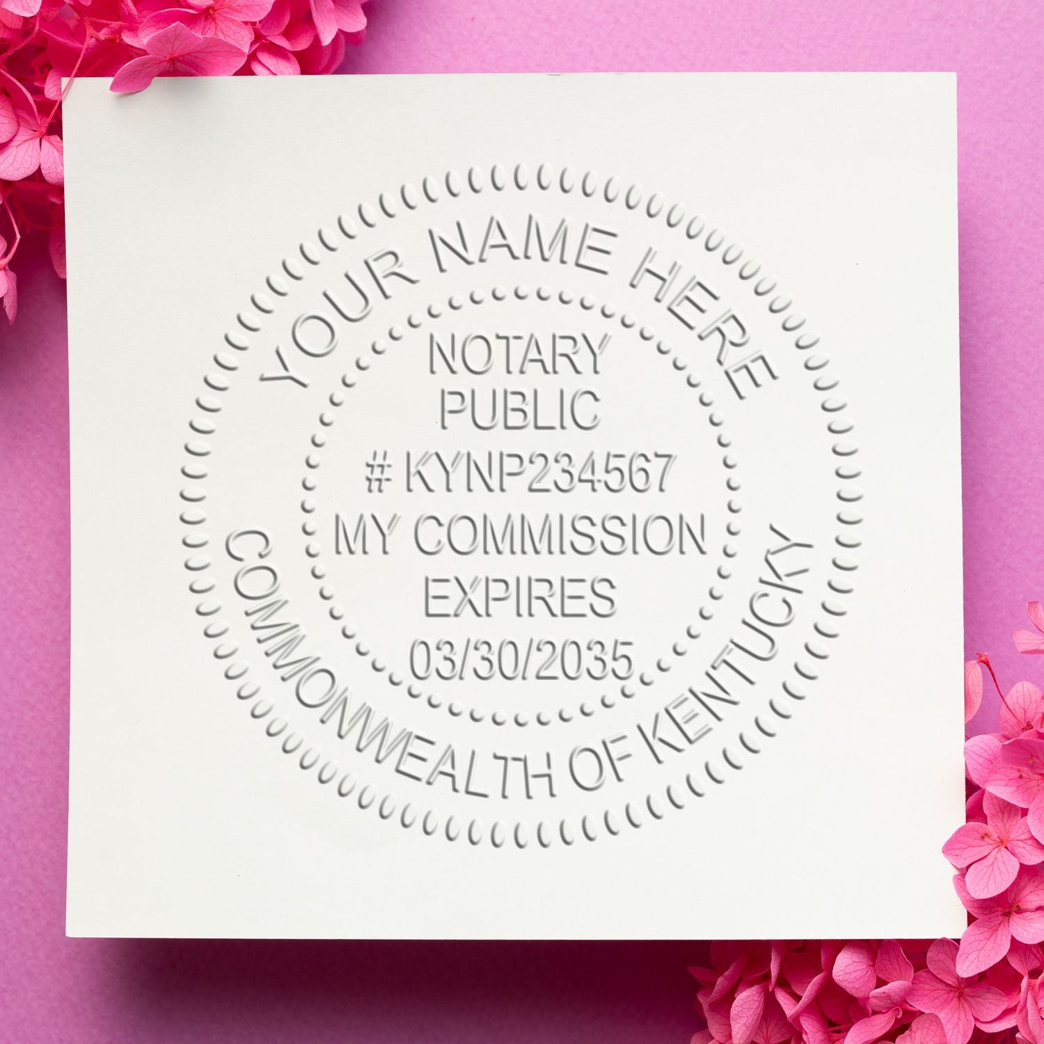 A stamped impression of the Kentucky Handheld Notary Seal Embosser in this stylish lifestyle photo, setting the tone for a unique and personalized product.