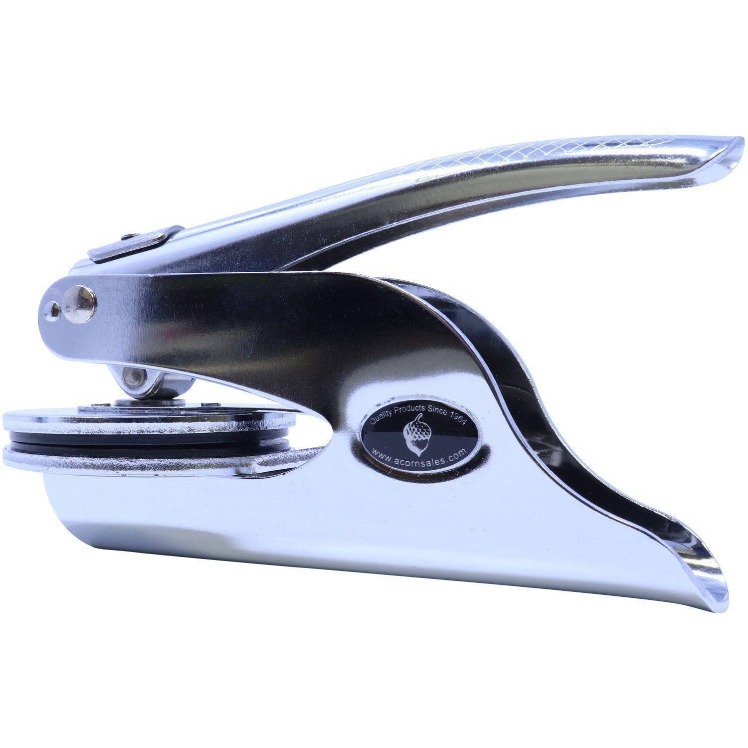 Side view of the Architect Handheld Seal Embosser, featuring a sleek, metallic design with a 2-inch imprint area. The embosser is angled to the right, showcasing its ergonomic handle and sturdy construction.