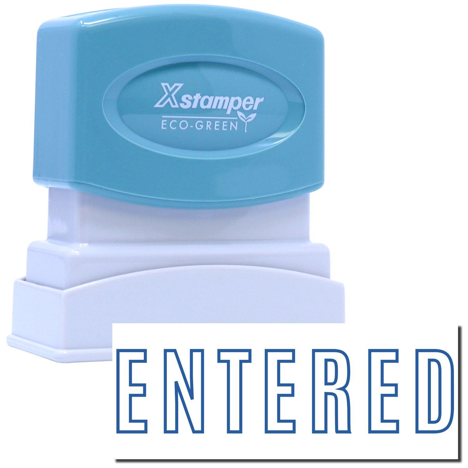 Blue Entered Xstamper Stamp with ENTERED text imprint, featuring a blue top and white base, designed for office use.