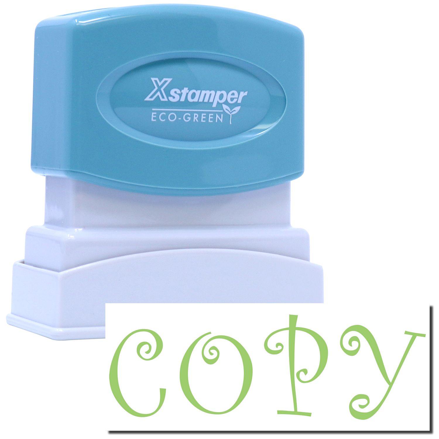 An xstamper stamp with a stamped image showing how the text COPY in a green color is displayed after stamping.