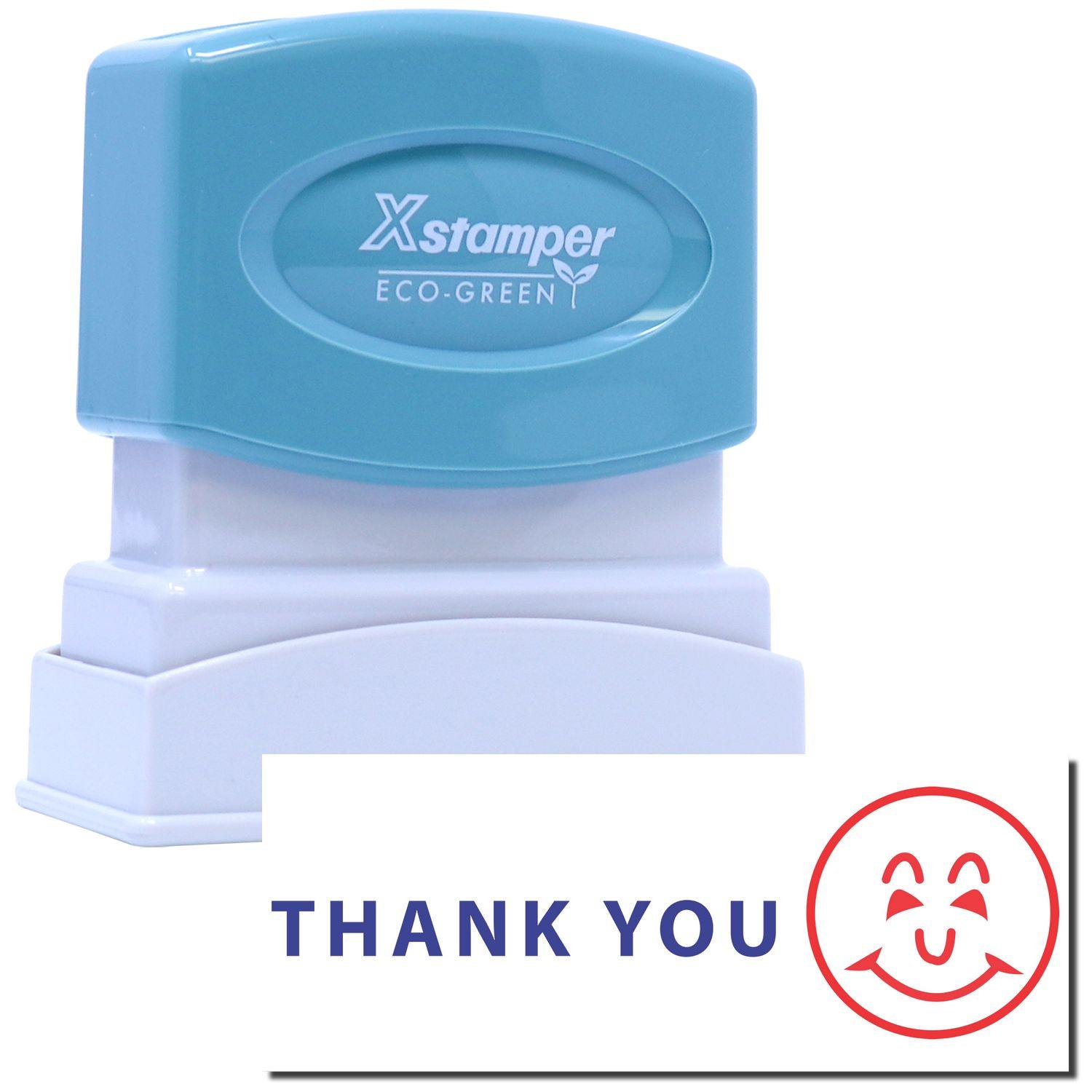 Two-Color Thank You Xstamper Stamp with a blue handle and white base, showing a stamped THANK YOU message with a smiling face icon.