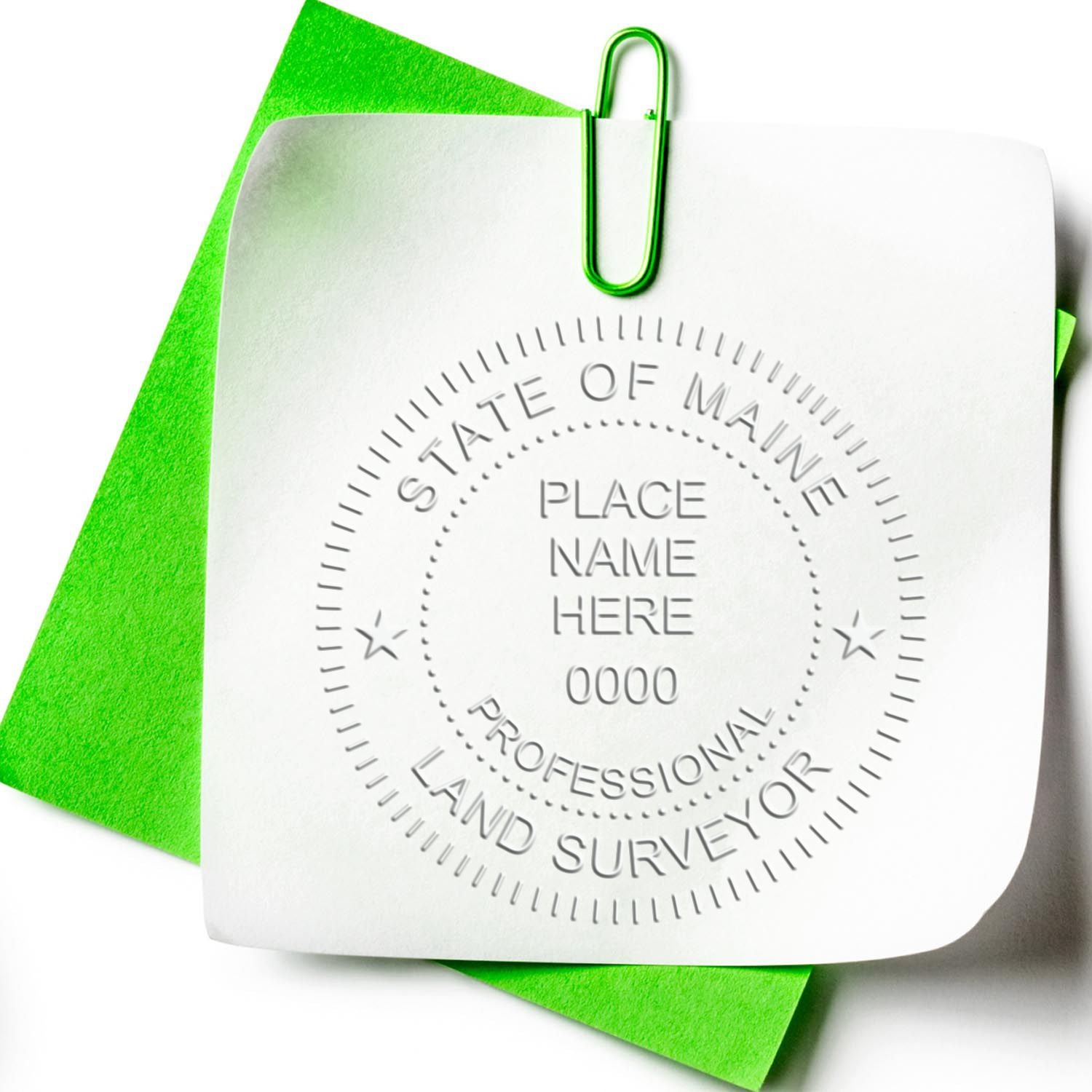 The main image for the Handheld Maine Land Surveyor Seal depicting a sample of the imprint and electronic files