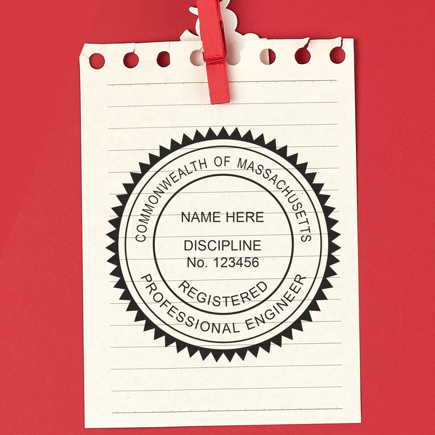 A lifestyle photo showing a stamped image of the Massachusetts Professional Engineer Seal Stamp on a piece of paper