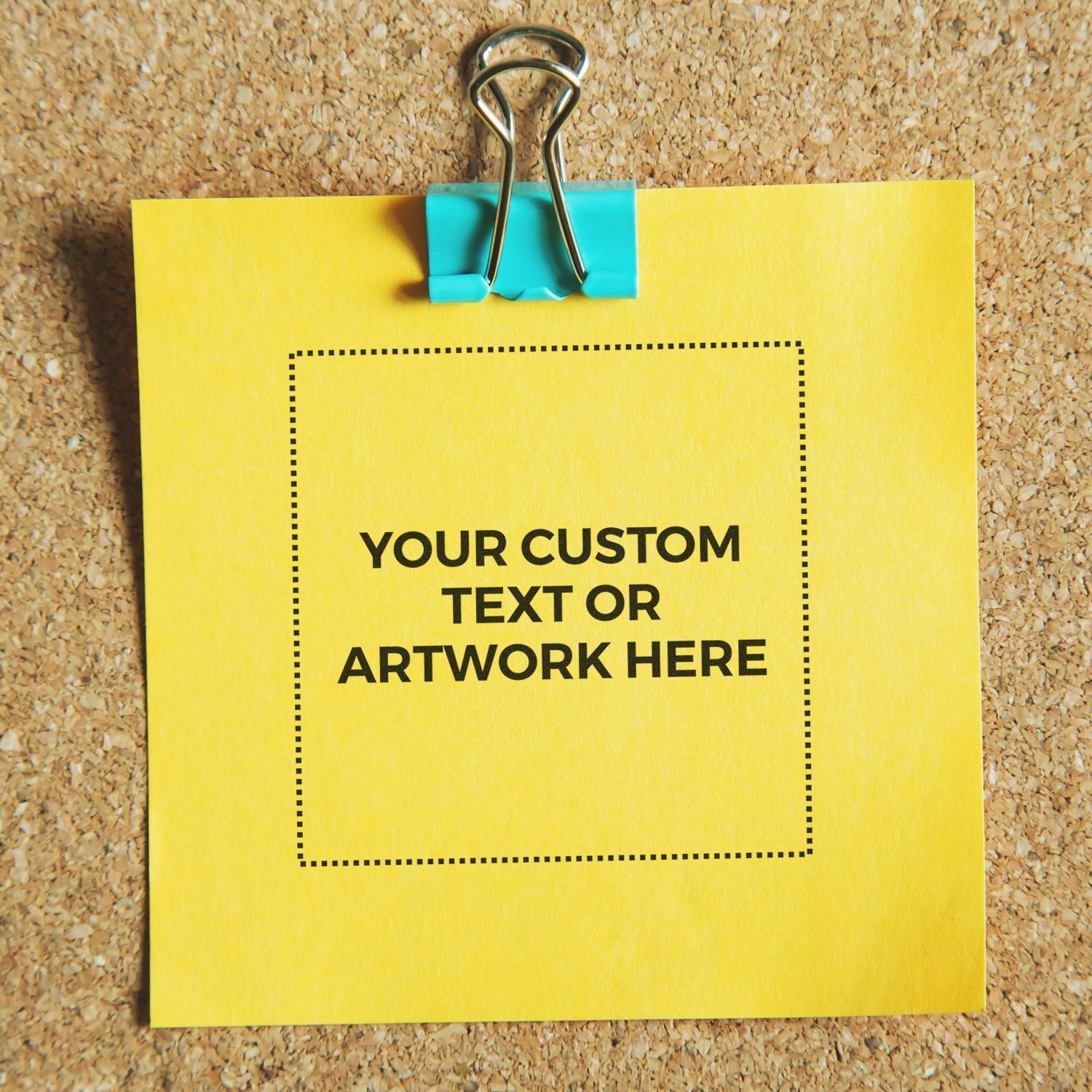 Yellow sticky note on corkboard with text Your Custom Text or Artwork Here stamped by MaxLight XL2-5050 Custom Pre-Inked Business Stamp 2 x 2.