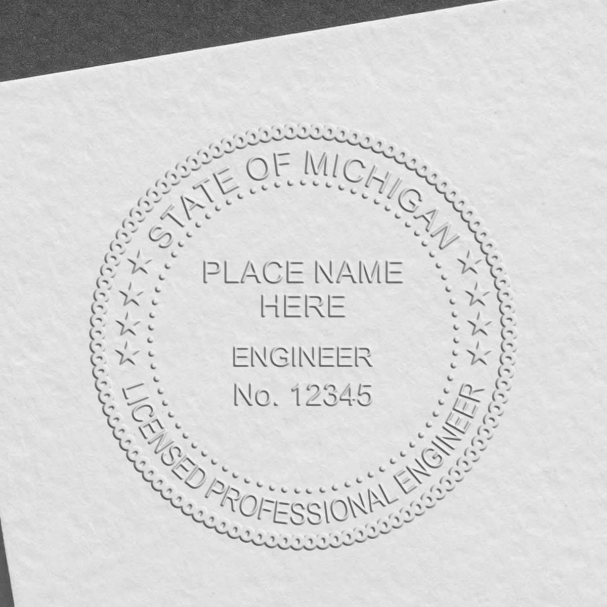 The Gift Michigan Engineer Seal stamp impression comes to life with a crisp, detailed image stamped on paper - showcasing true professional quality.