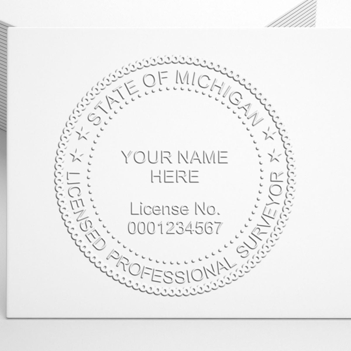 A photograph of the State of Michigan Soft Land Surveyor Embossing Seal stamp impression reveals a vivid, professional image of the on paper.