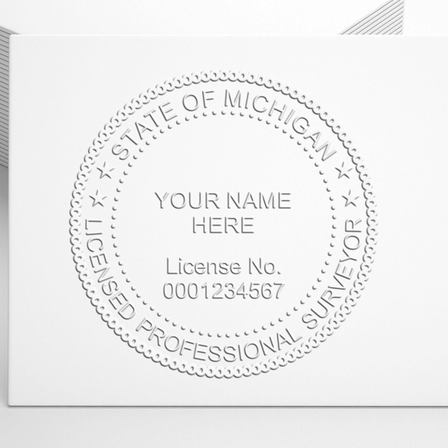 A stamped impression of the Michigan Desk Surveyor Seal Embosser in this stylish lifestyle photo, setting the tone for a unique and personalized product.