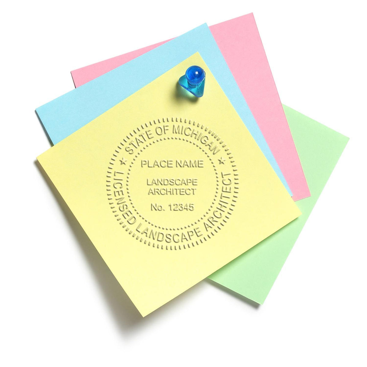 An in use photo of the Gift Michigan Landscape Architect Seal showing a sample imprint on a cardstock